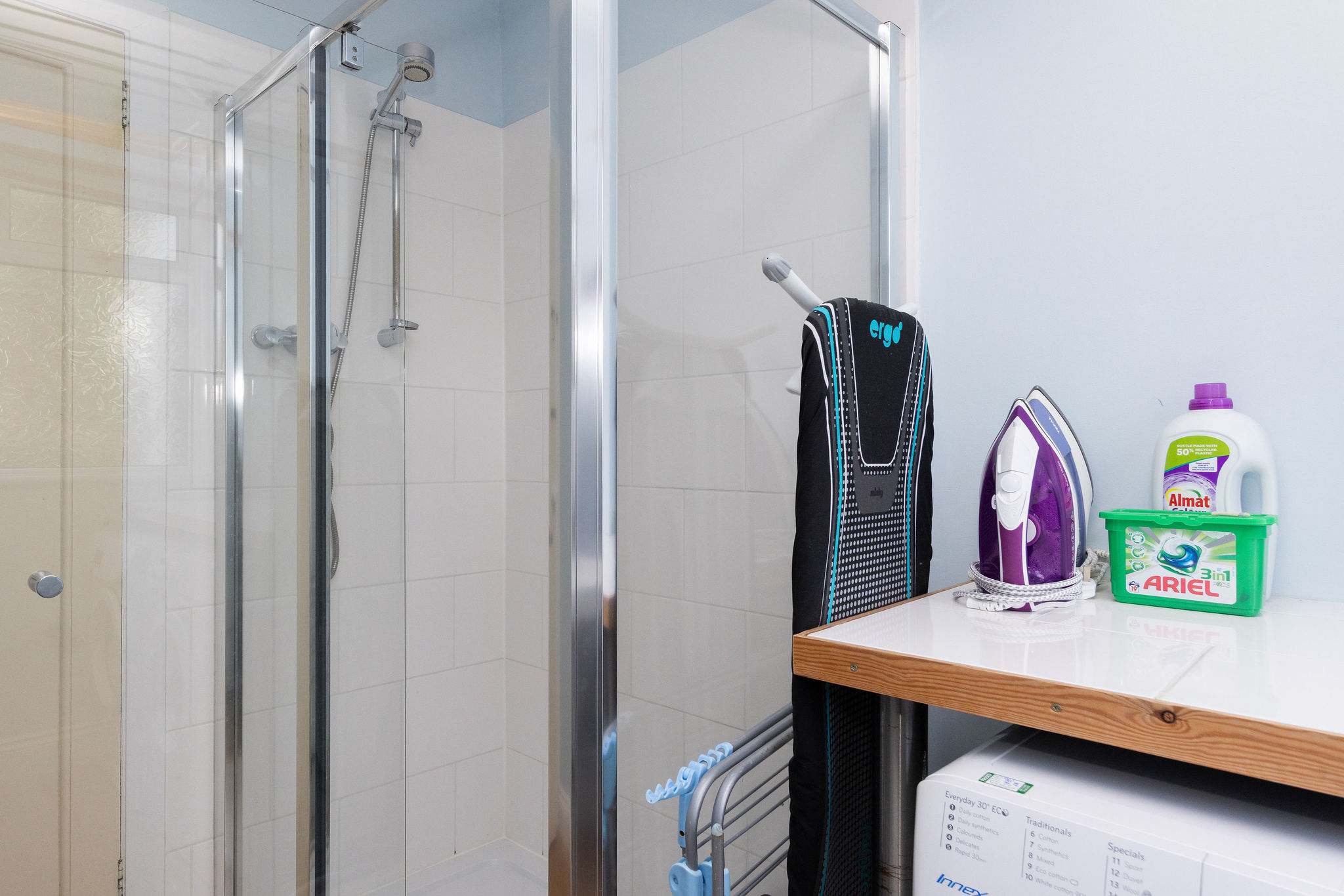 Handy downstairs bathroom with shower, toilet and sink