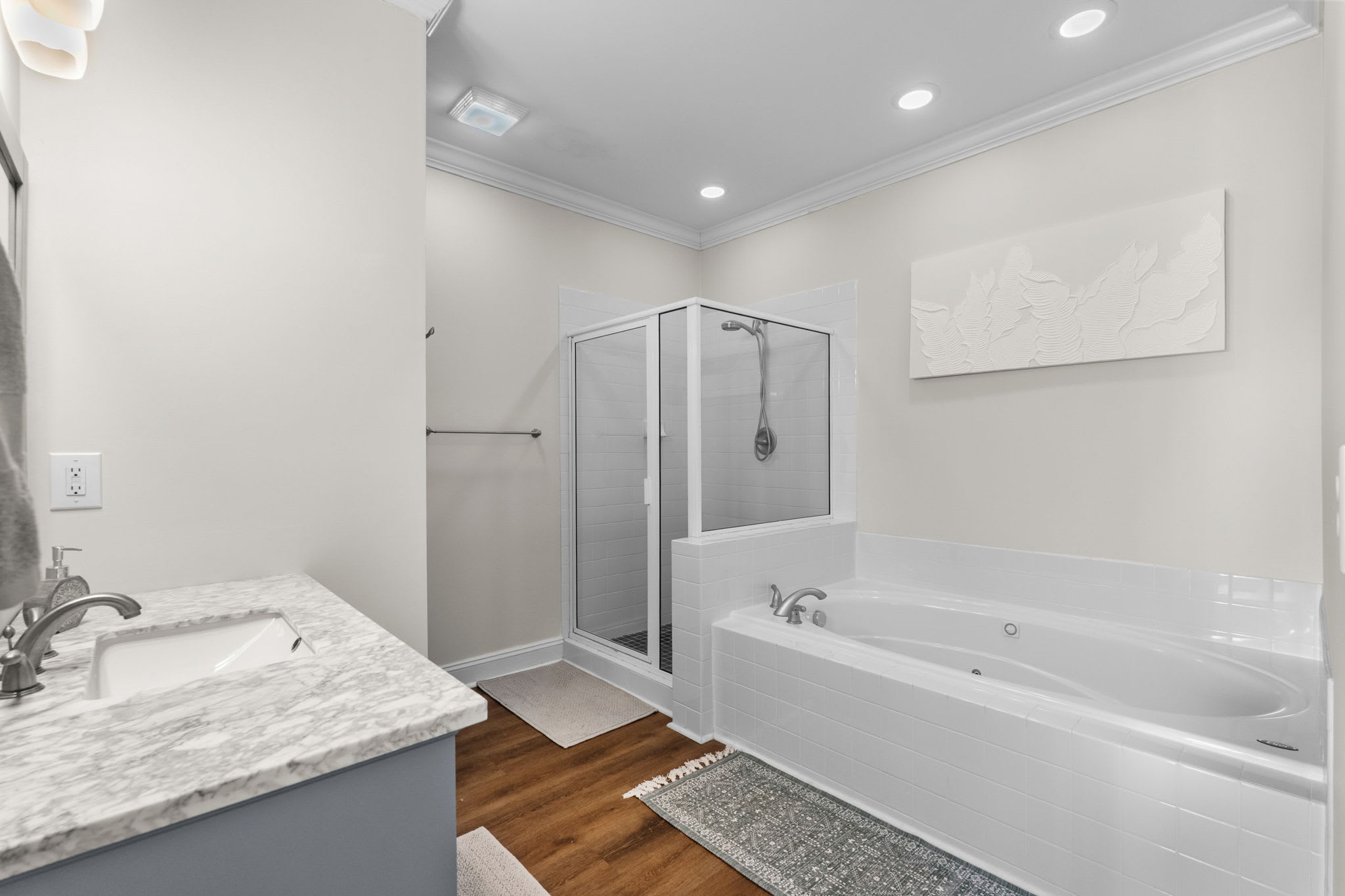 Bathroom with tub and shower