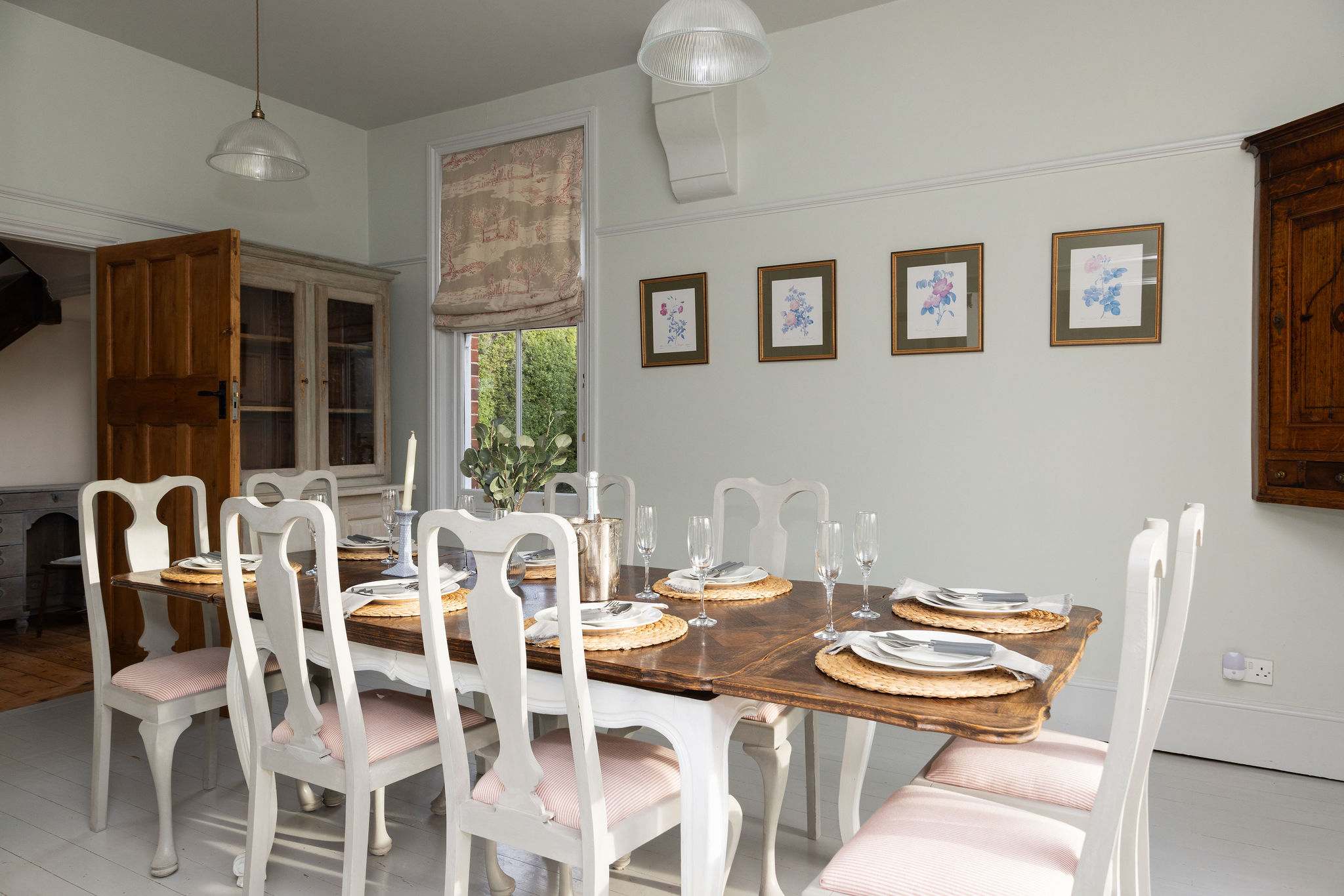 8 can sit comfortably at this table with another 6 at the table close by in the breakfast room