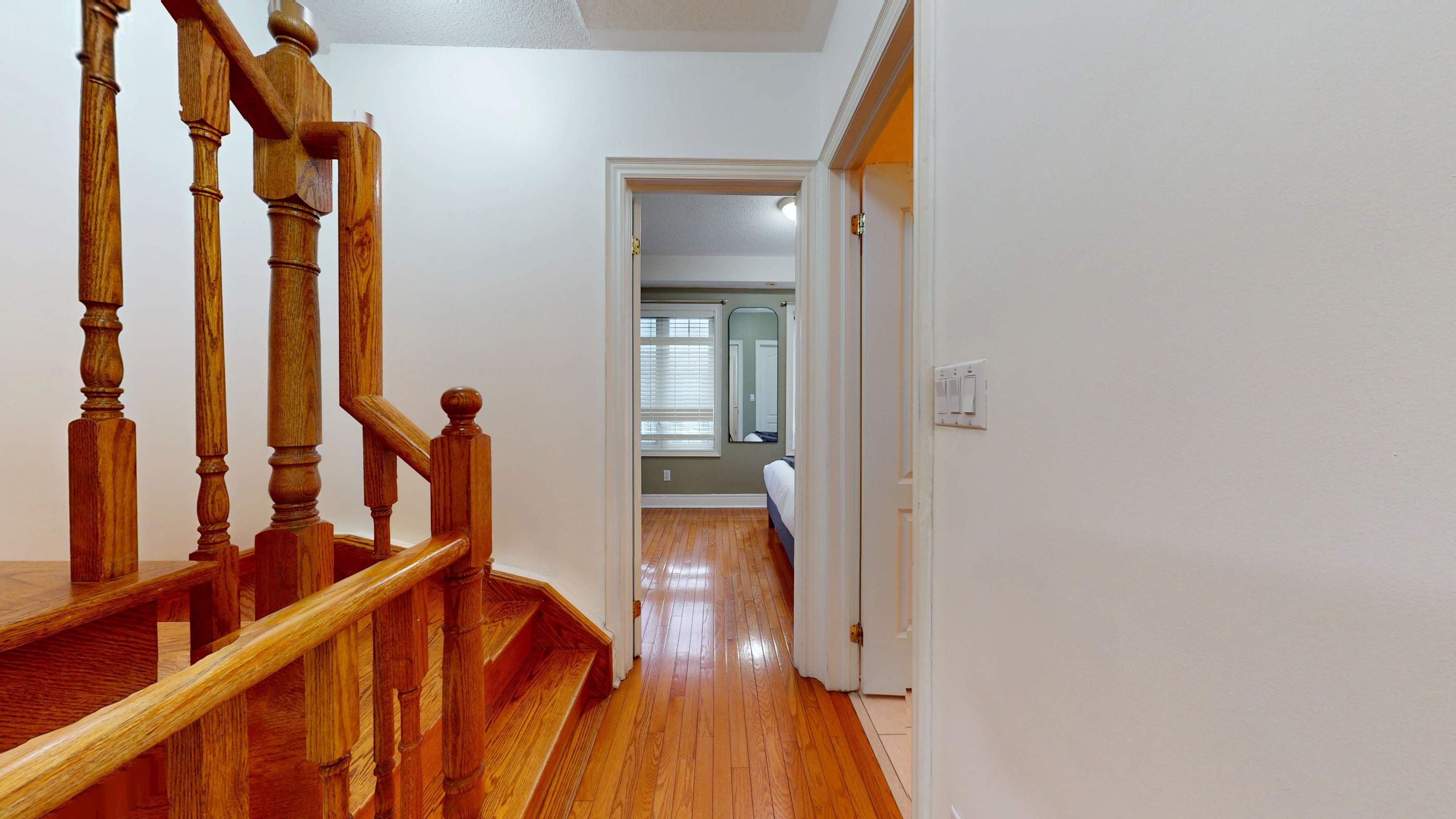Staircase and Hallway leading the bedrooms 