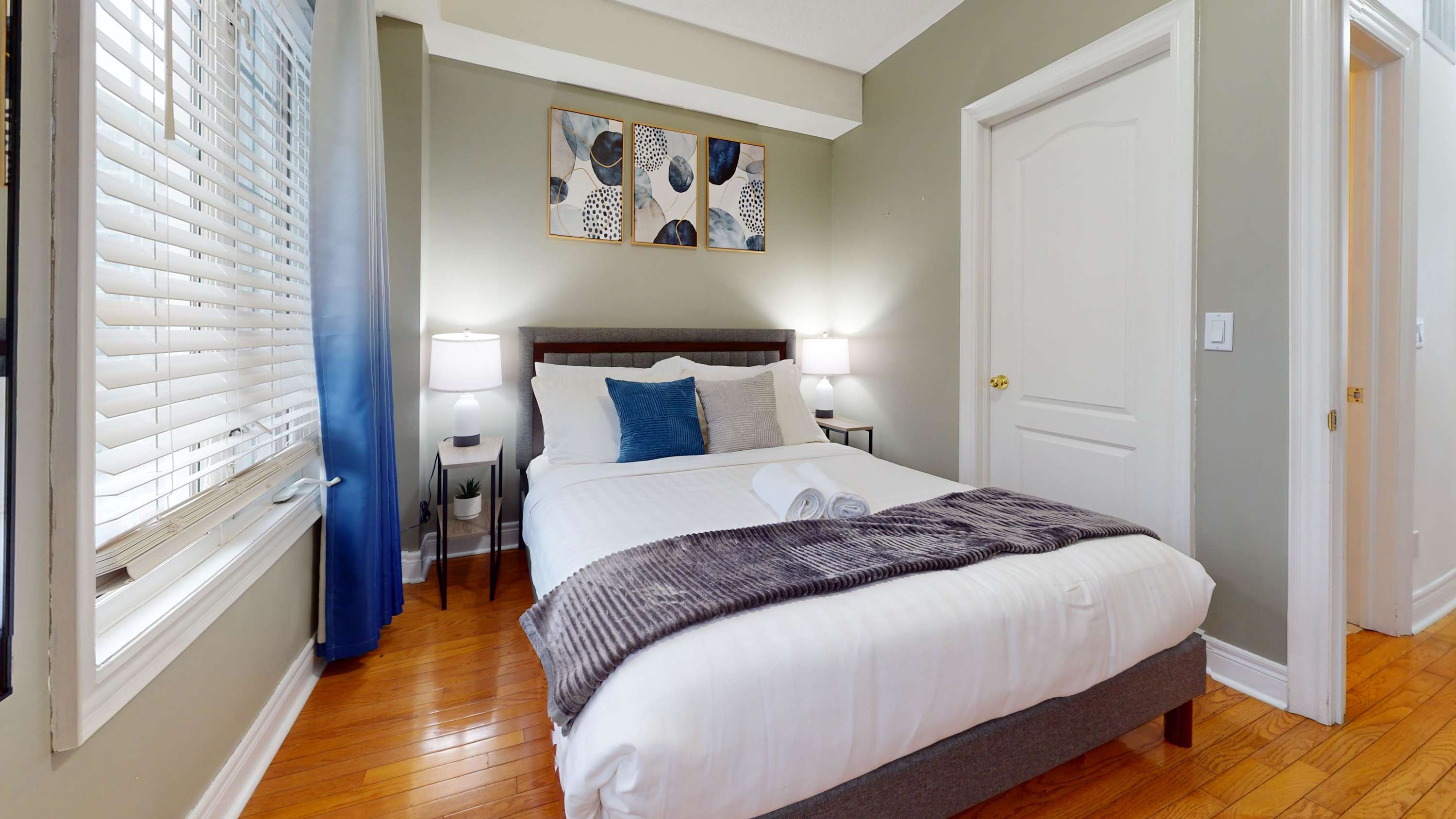 Queen Bedroom | Ensuite Bathroom - A peaceful retreat featuring a comfortable queen bed, ample natural light, and a private ensuite bathroom with a shower/tub combo.