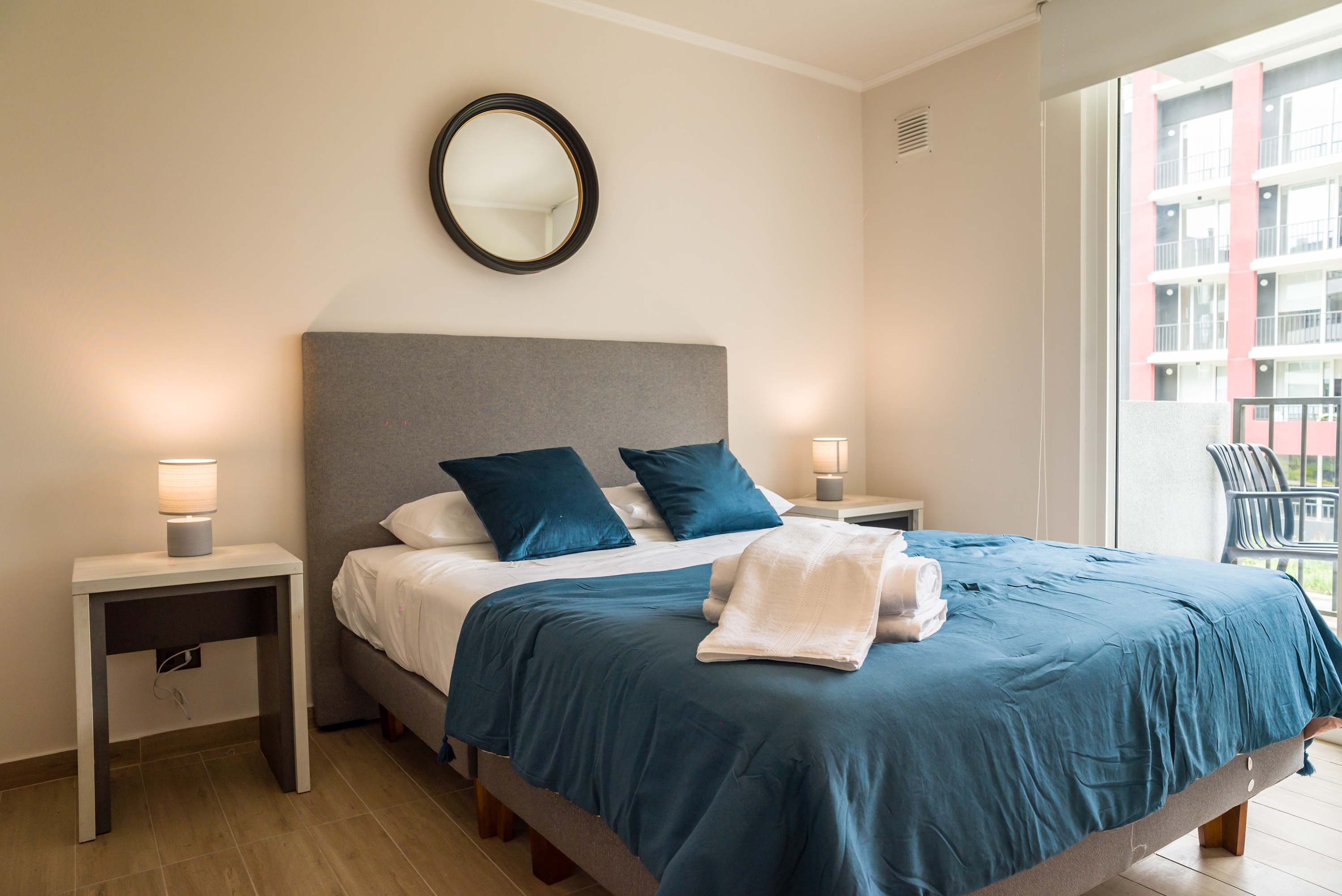 Cozy bedroom with plush bedding and a relaxing ambiance, perfect for unwinding after a day of exploring.