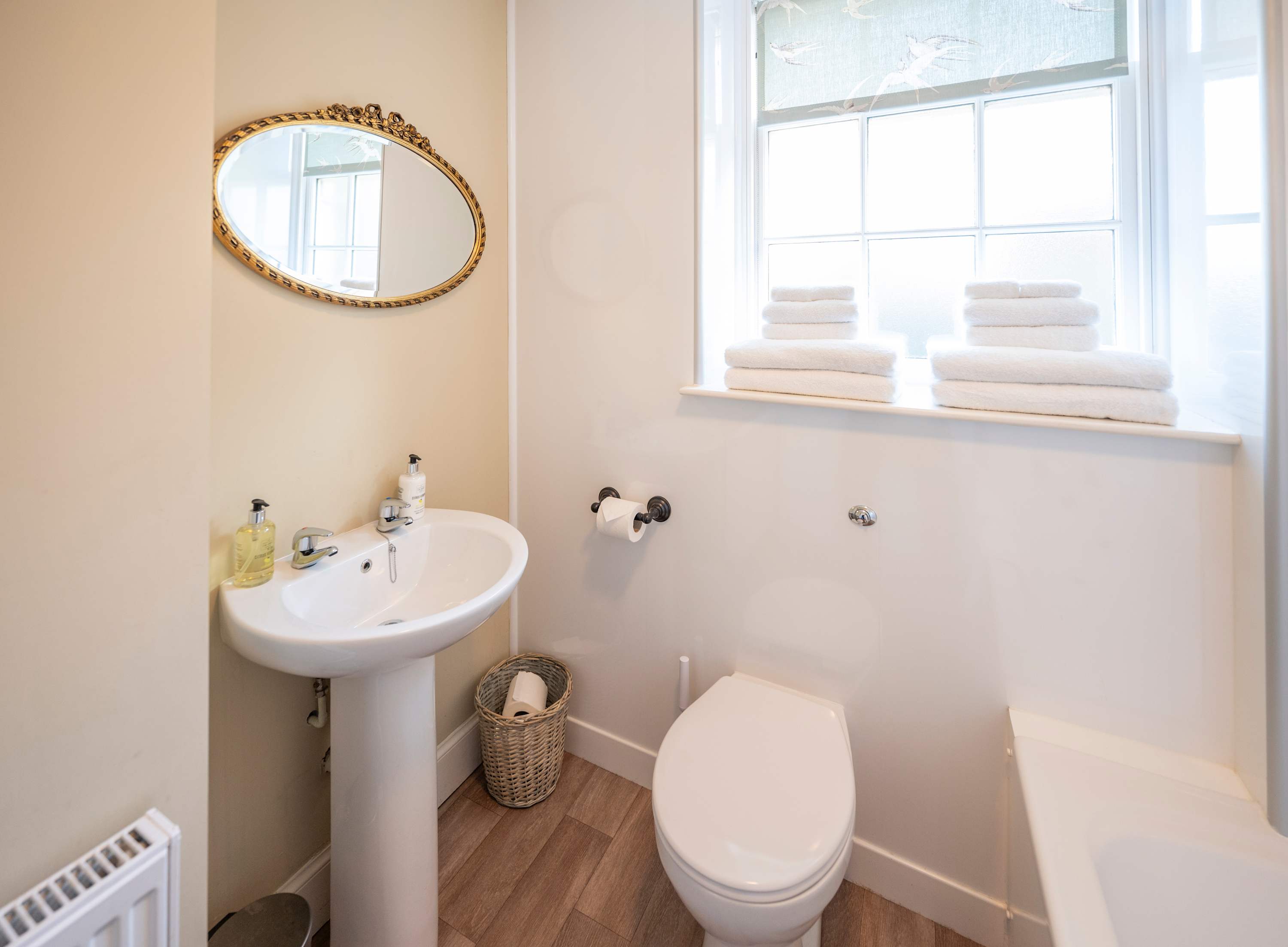 Fresh Bathroom Space with Bathtub and Shower