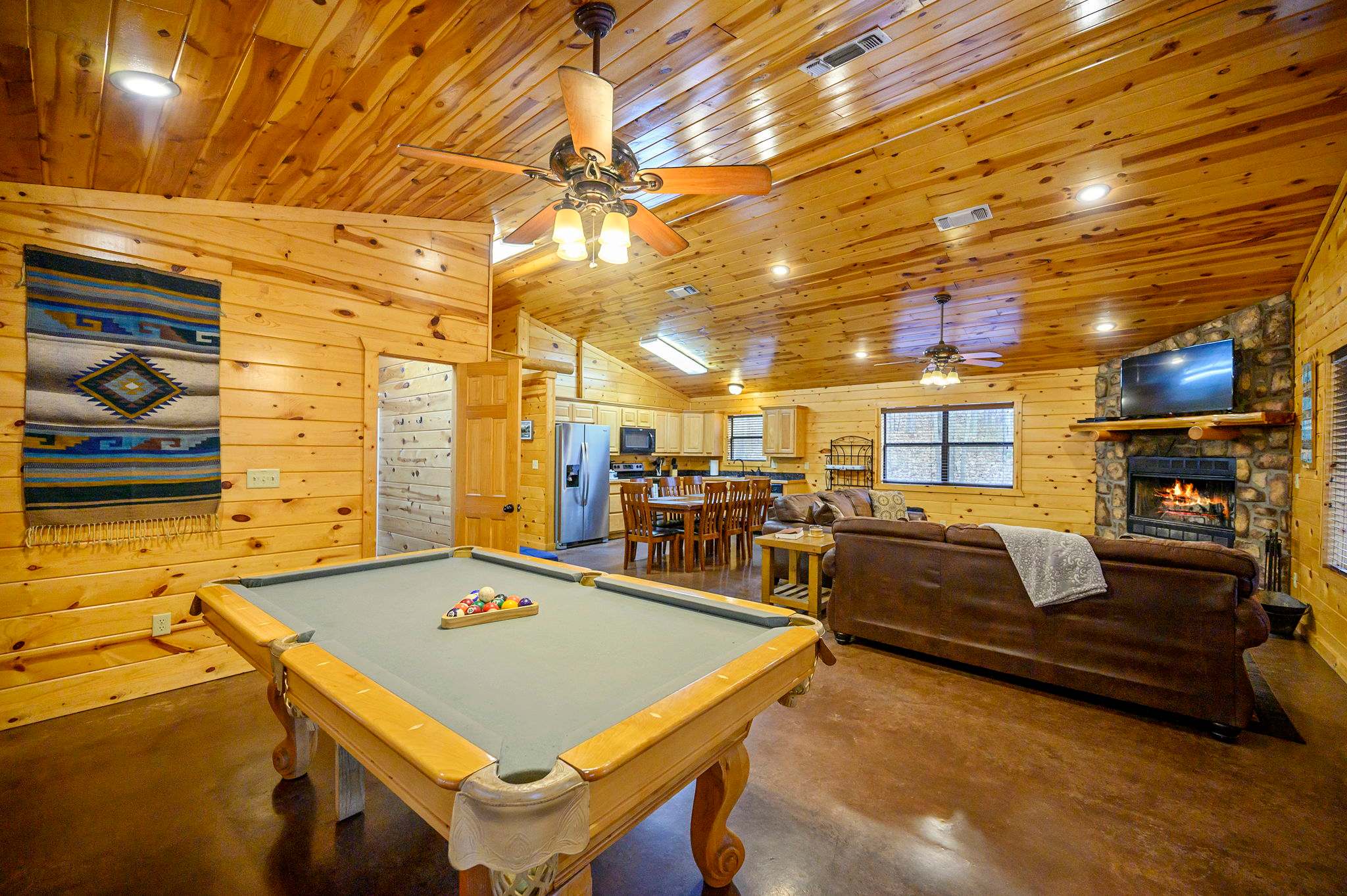 Pool table set within the open living area for fun gatherings