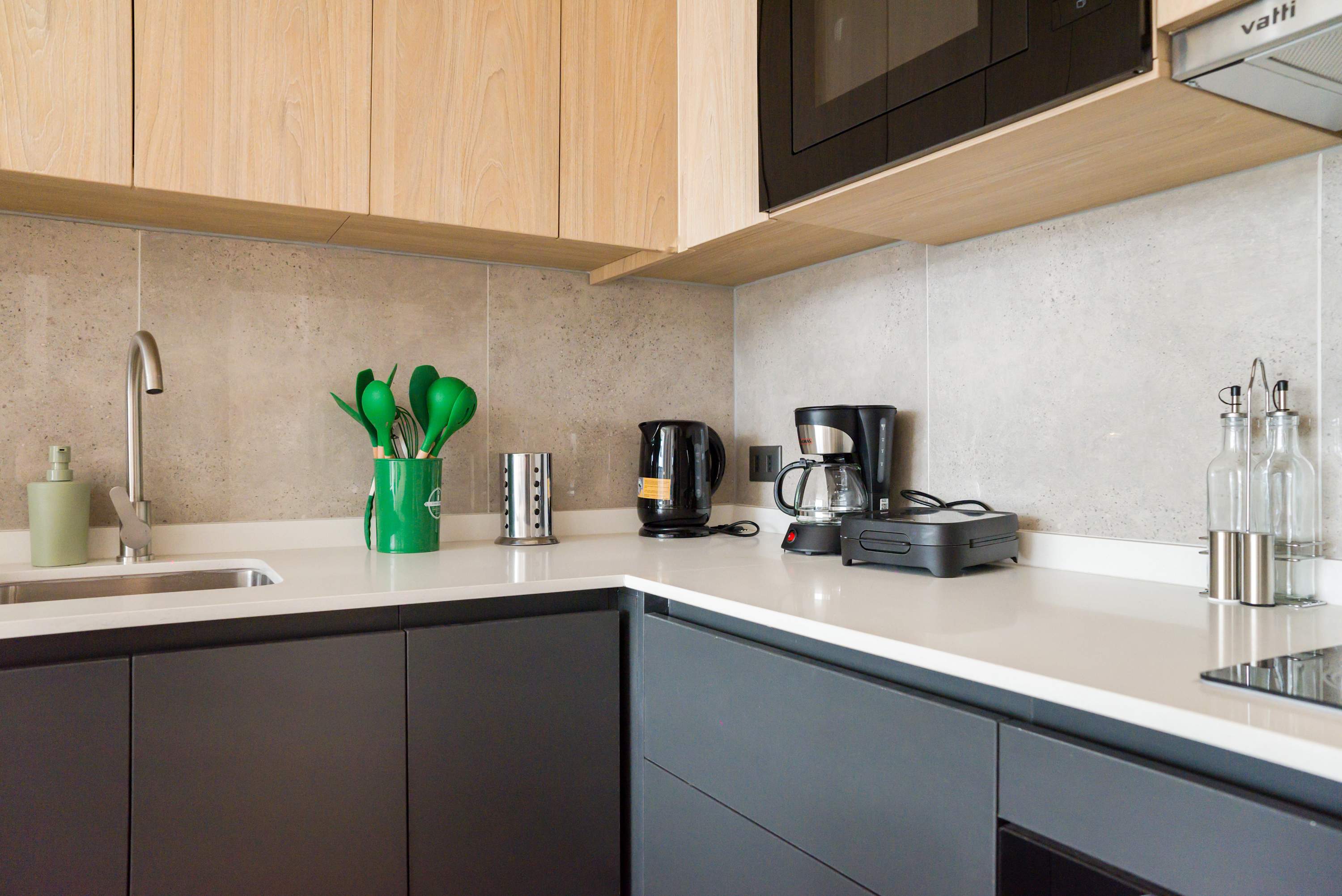 Sleek and modern kitchen with all essentials for a comfortable stay in the heart of Chile.