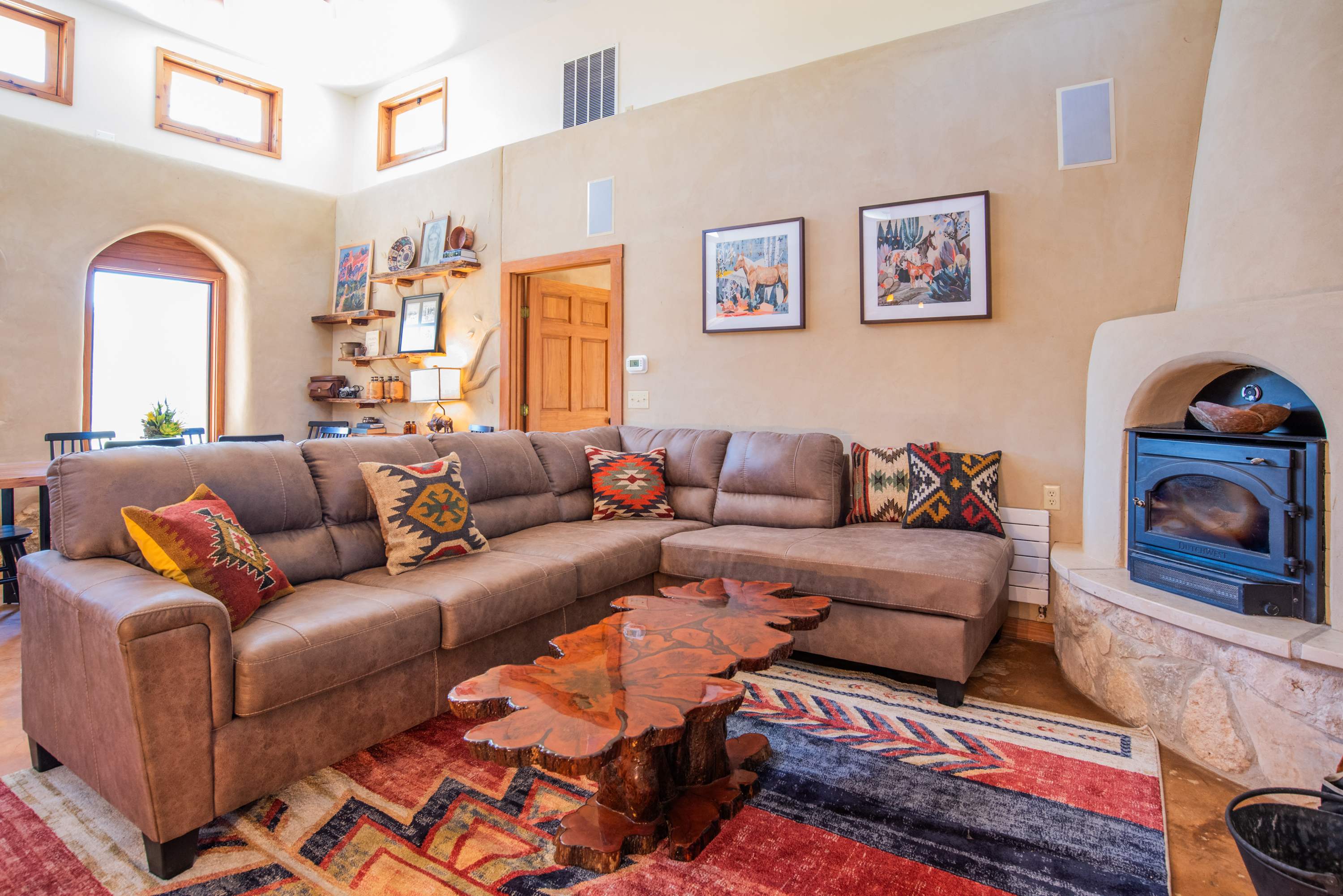 Relax in the open living space with fireplace and smart TV