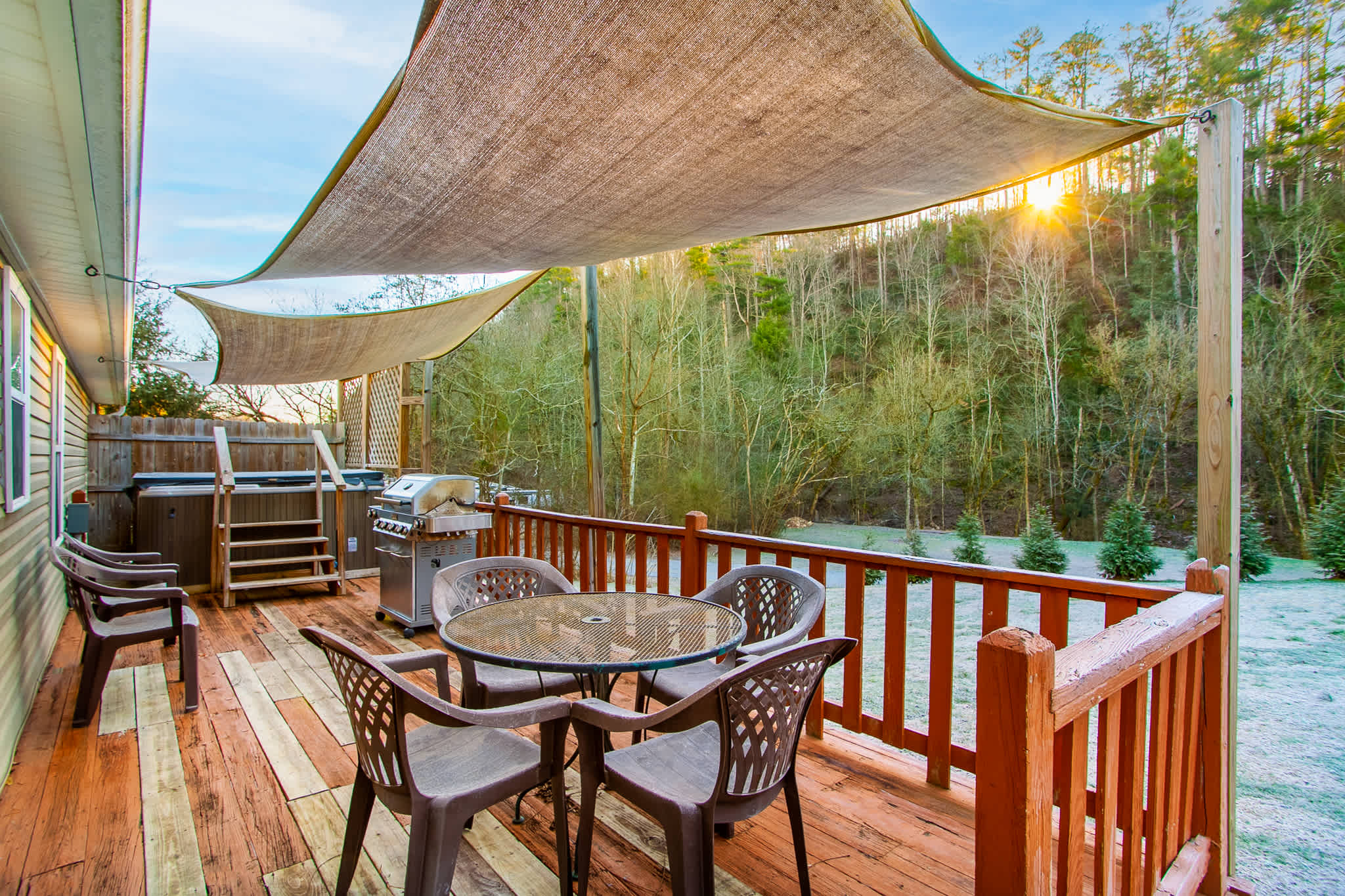 Relax on the back deck with a private 4-seat hot tub and outdoor dining area.