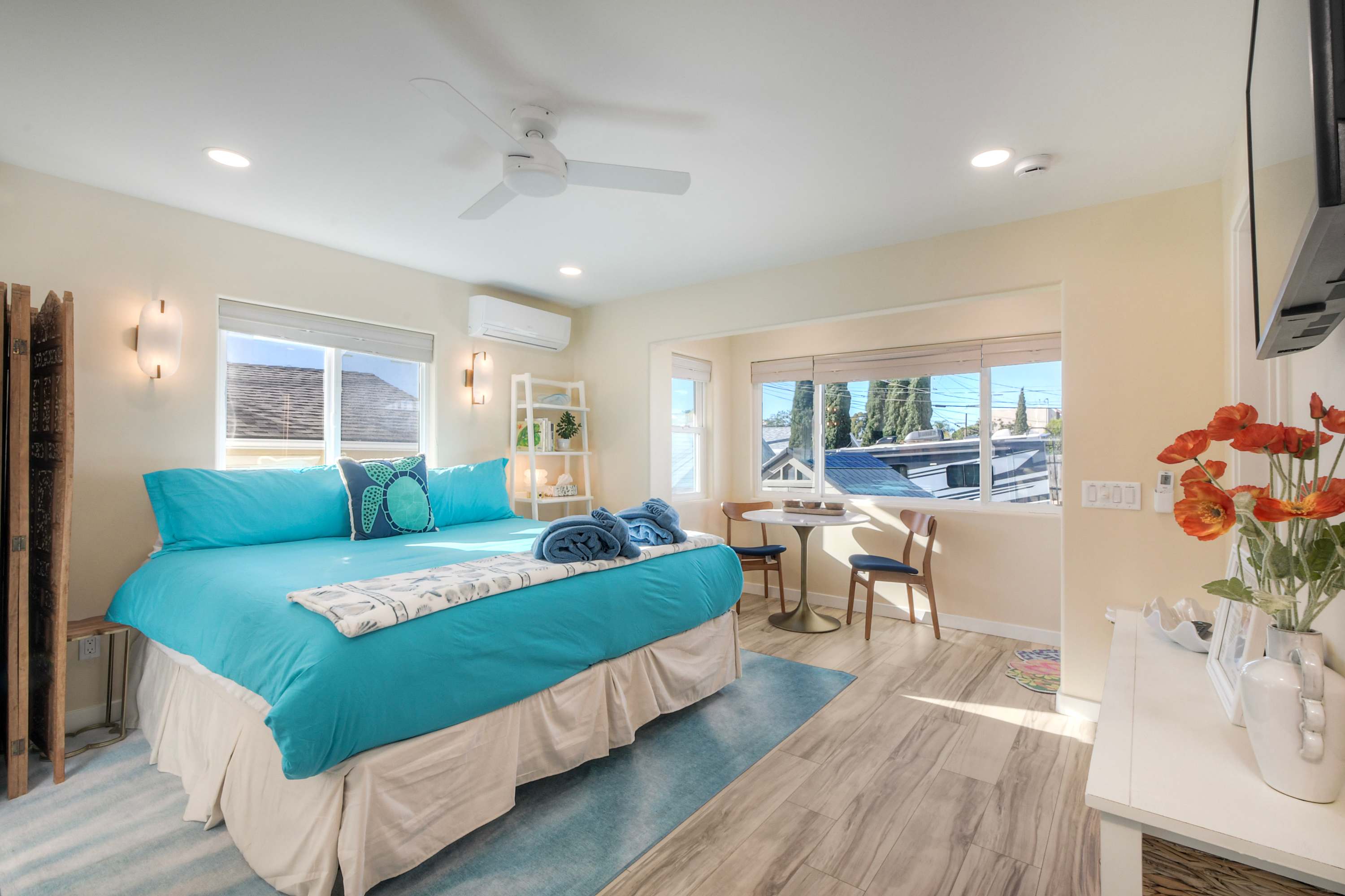 Comfortable studio with king bed, smart TV, kitchen, and bath