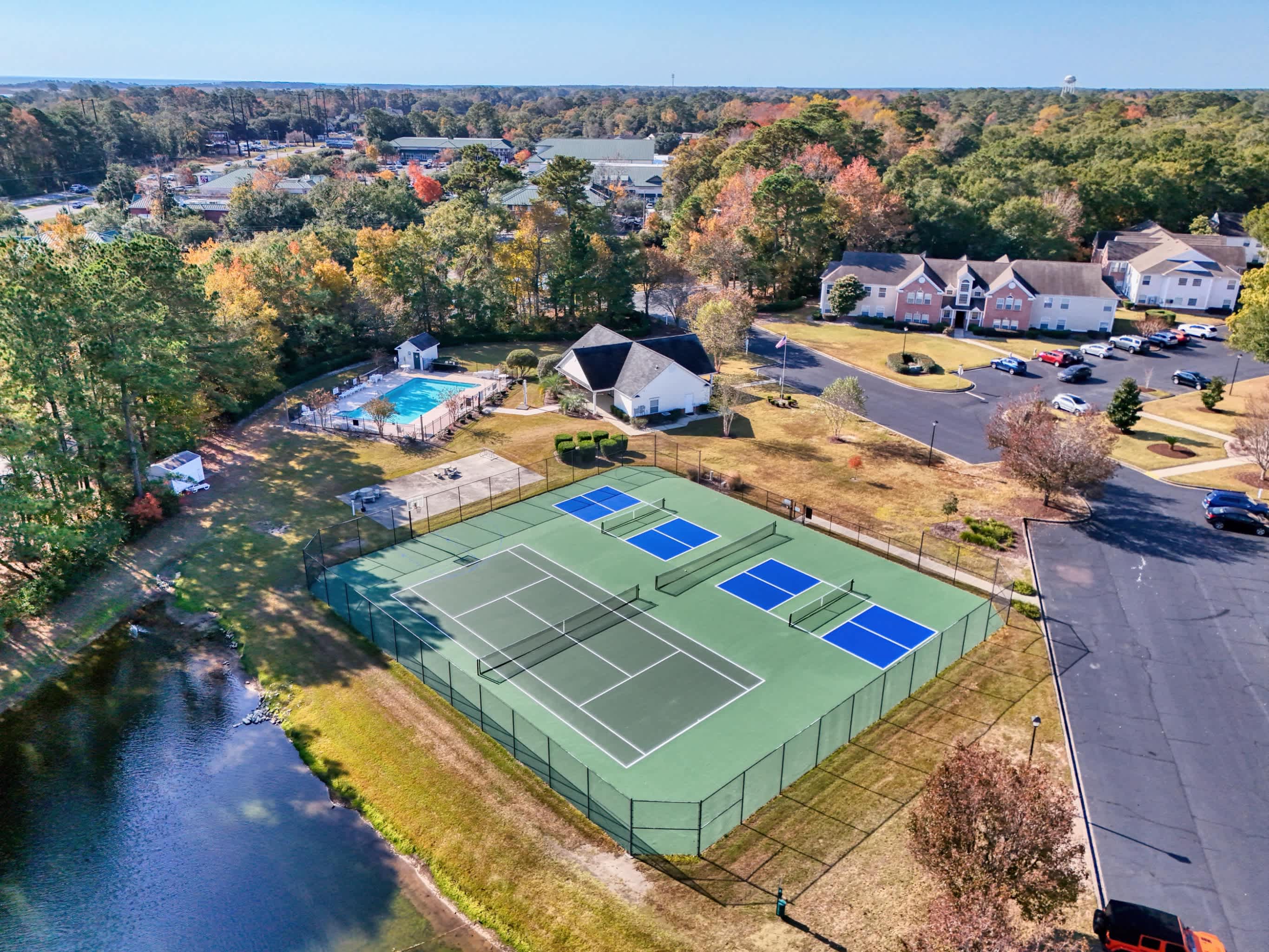 Coastal Comfort with Golf Pool Pickle Ball Tennis Courts | Photo 36
