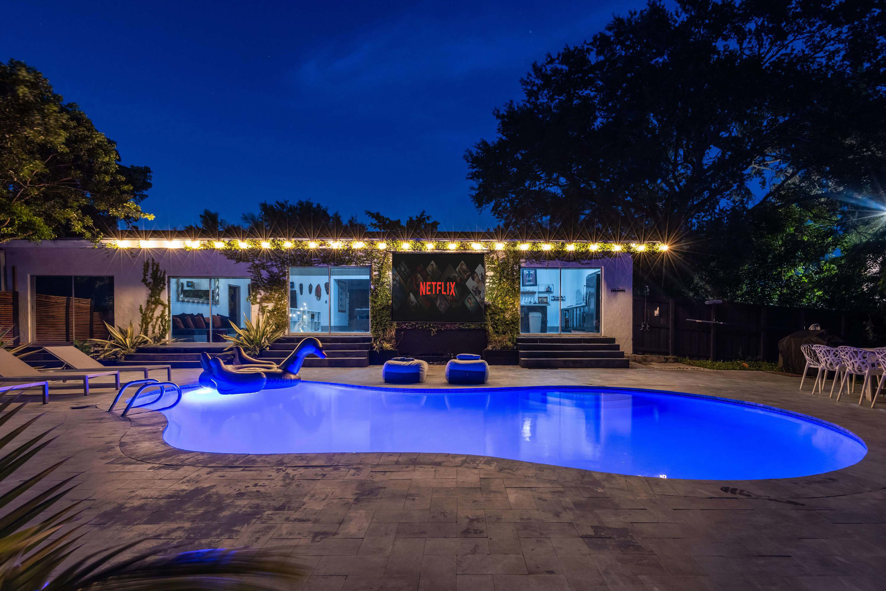 Nightview outdoor pool and projector