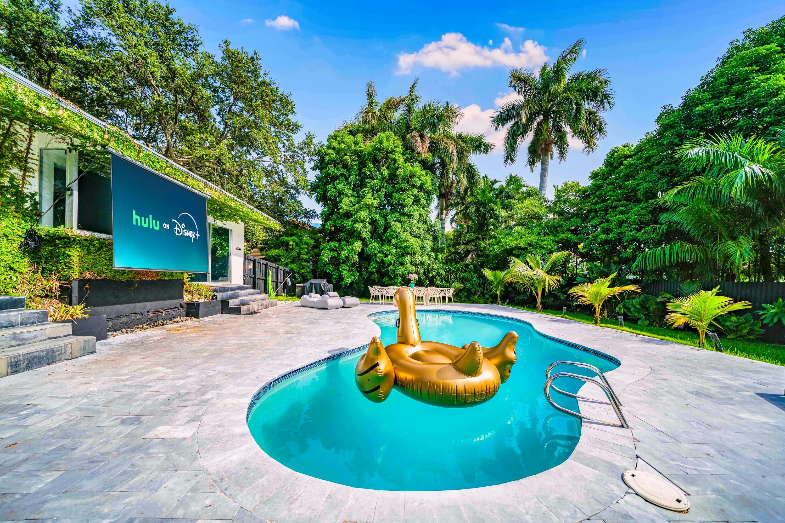Heated Pool with Swan Floatie
