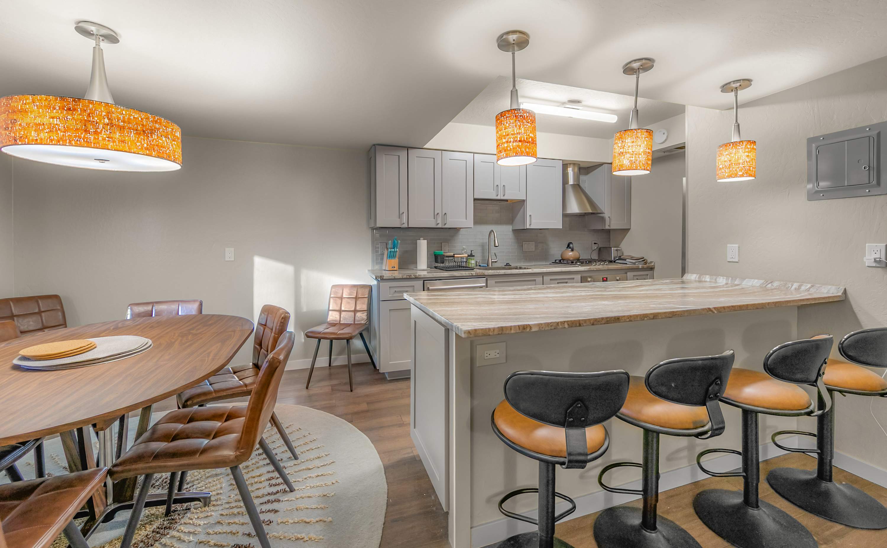 Gather and connect—open living, dining for 6, bar seating for 4