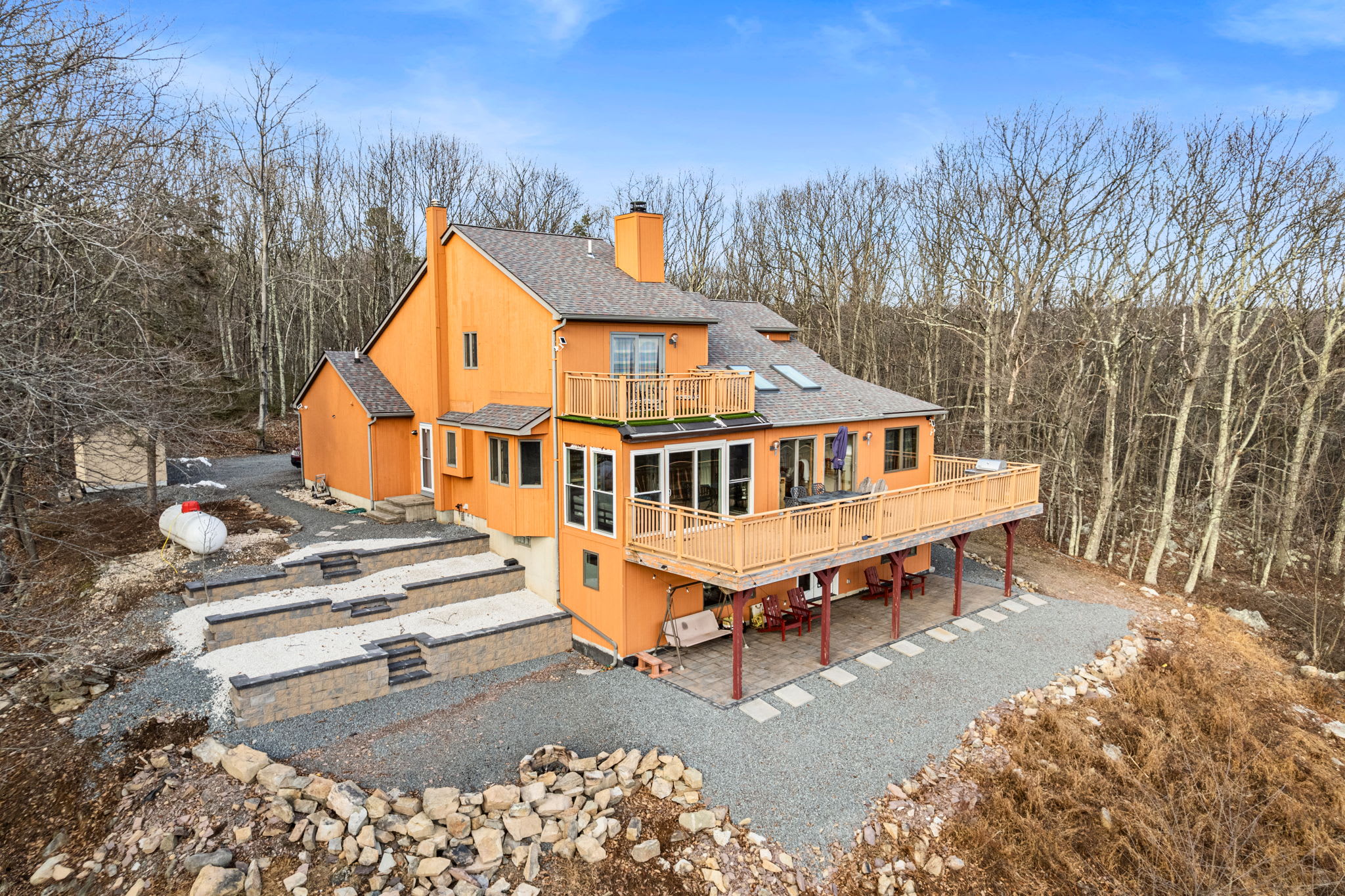 Welcome to your mountain escape! This charming retreat sits on a peaceful wooded lot, offering privacy and stunning natural surroundings and a brand new private back patio spanning 50+ miles of unparalleled views of the mountains!