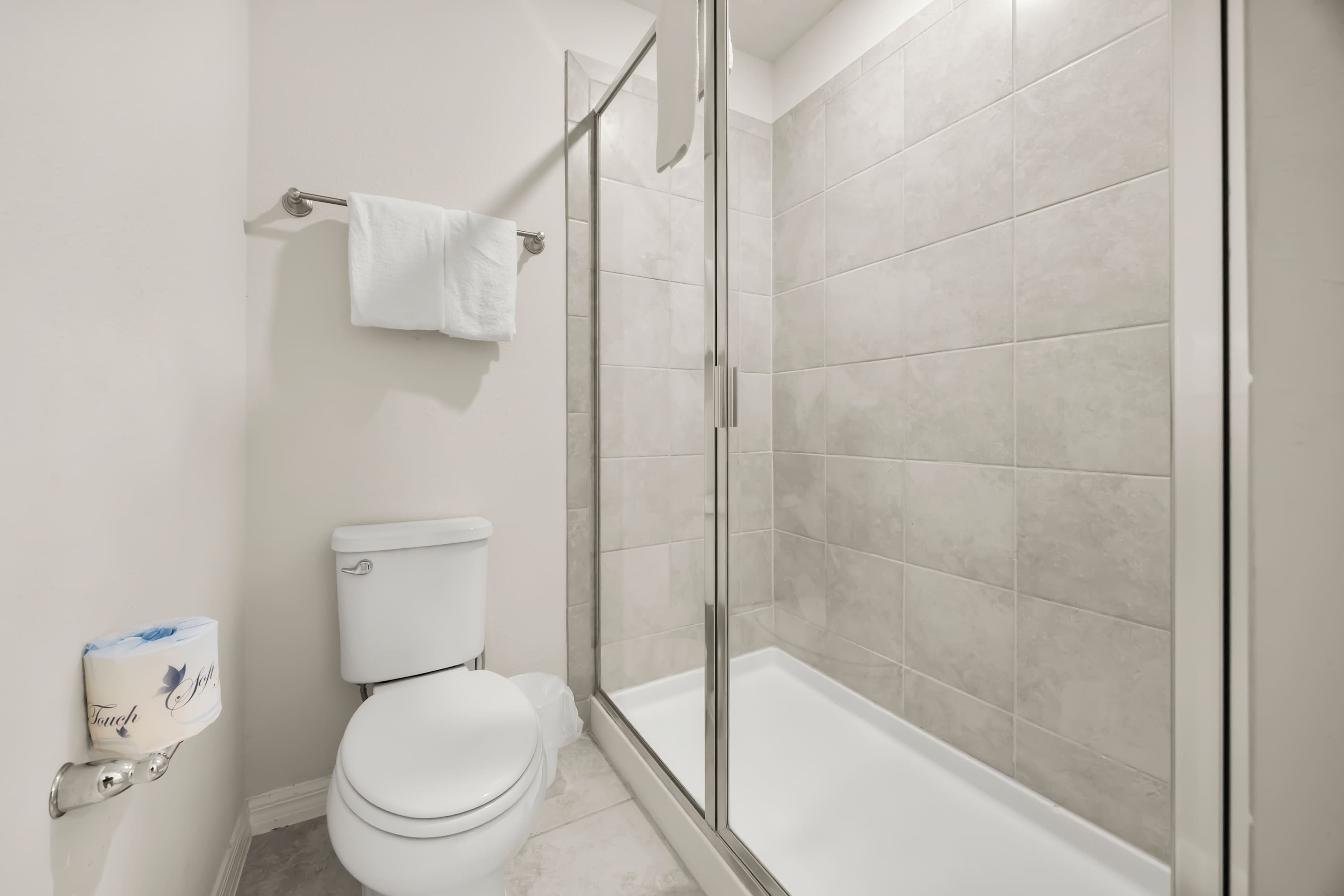 Full bathroom with a spacious standing shower