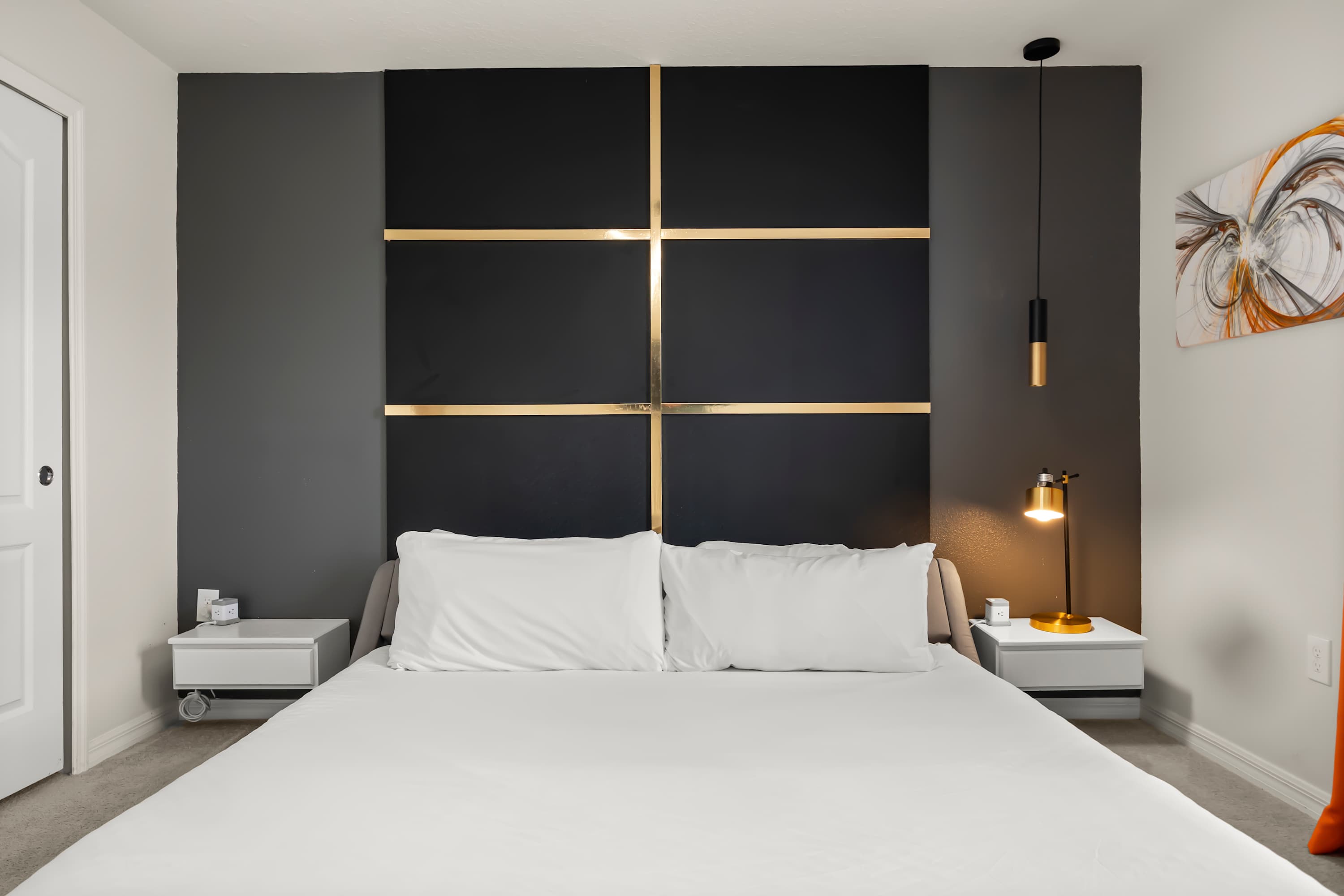 King bedroom with elegant decor and an en-suite bathroom