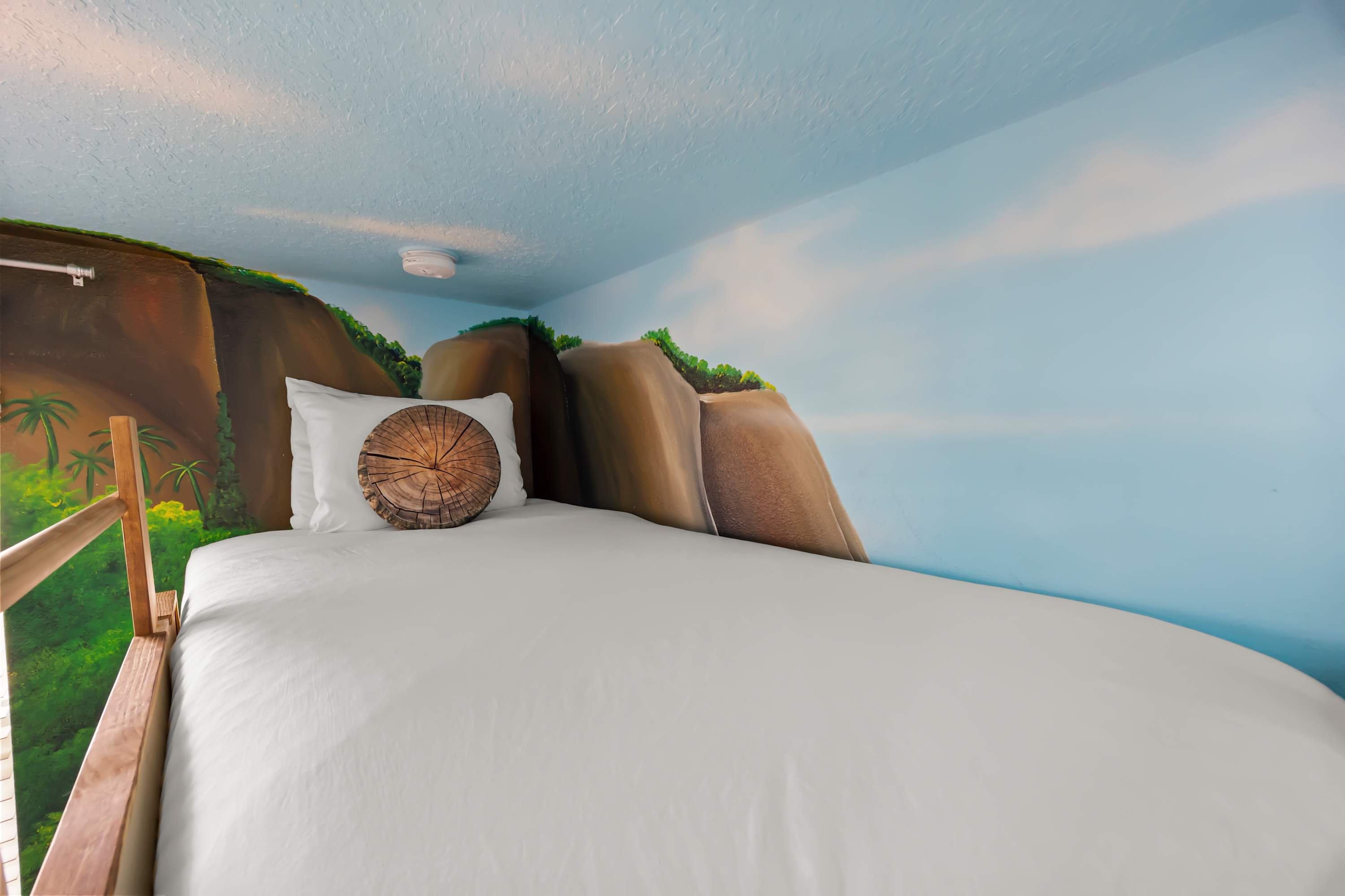 Bunk bedroom with exciting wall decor for children