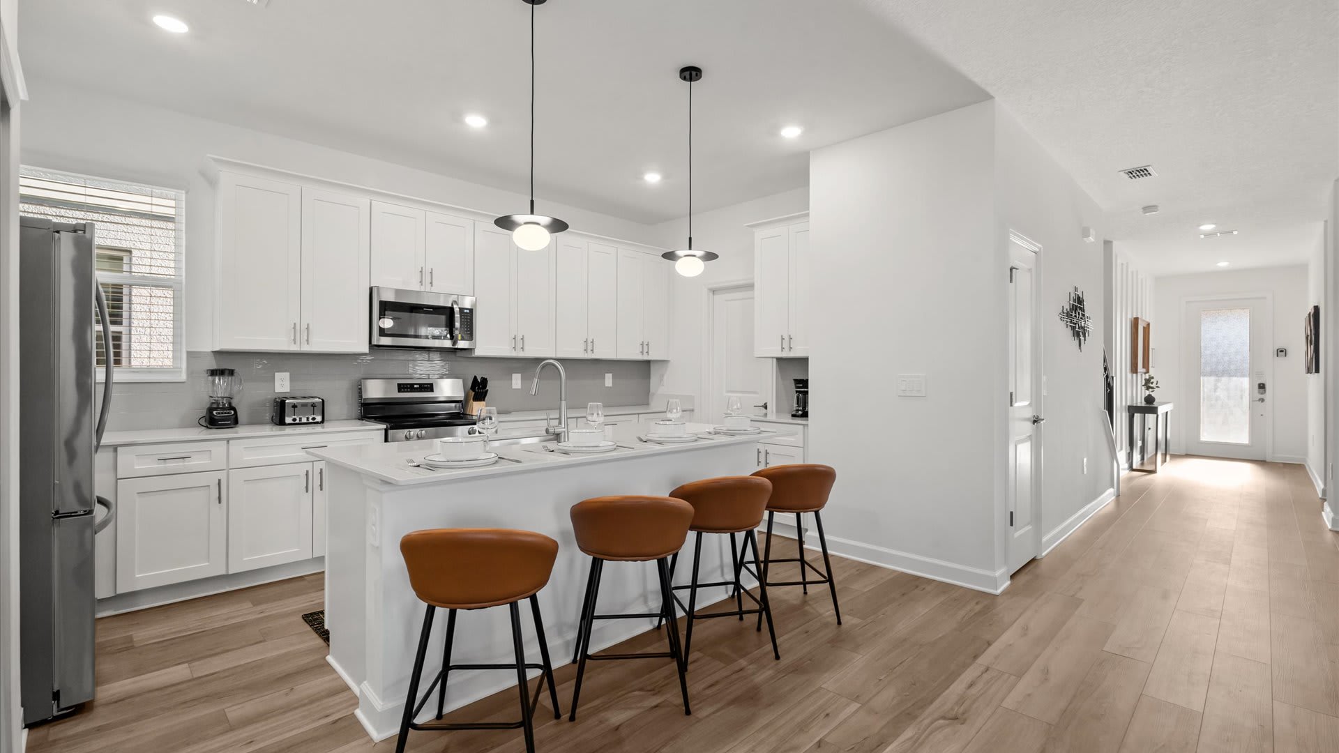 Chef’s kitchen with island seating – Fully equipped and guest-ready