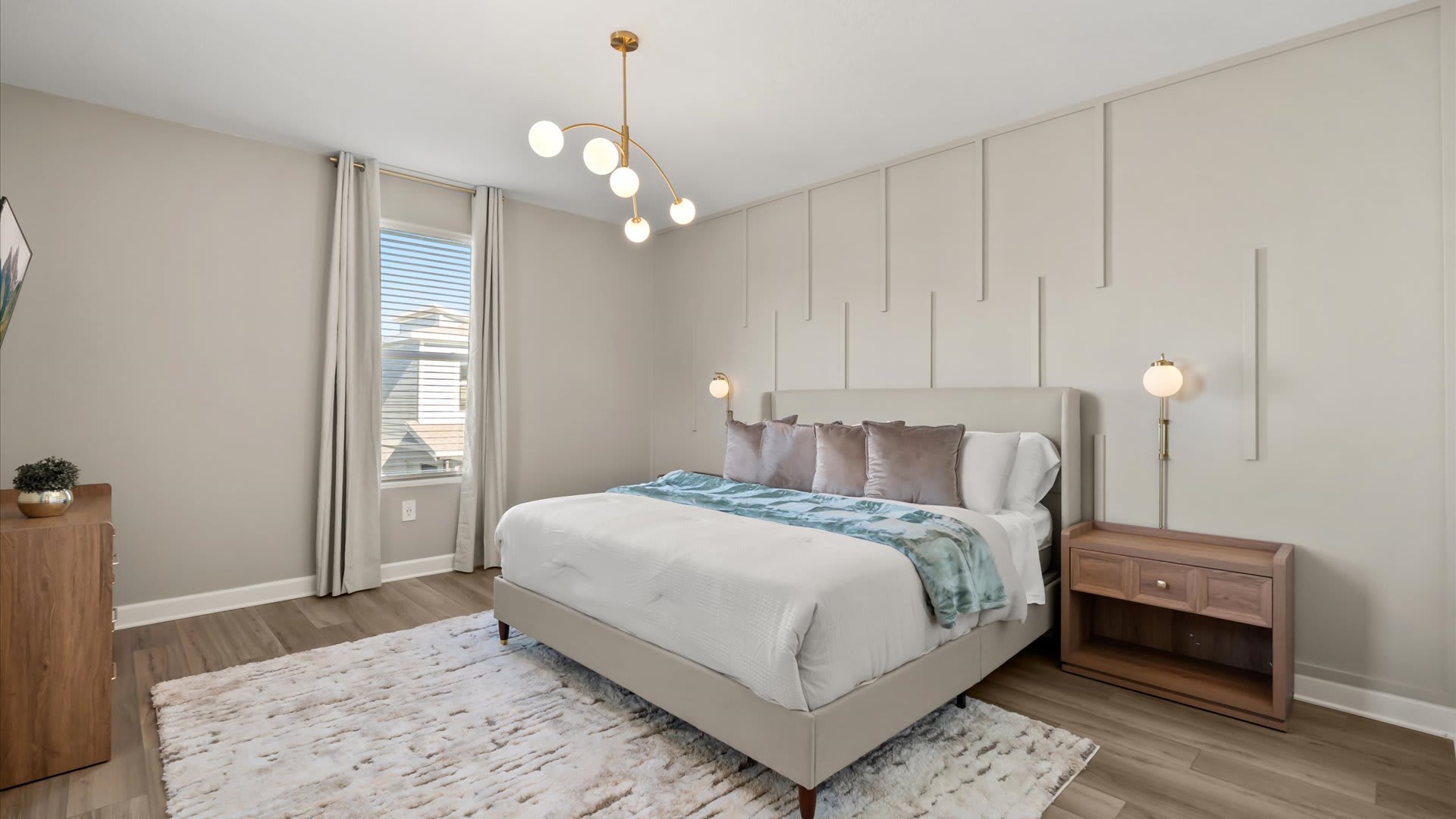 Primary bedroom retreat – complete with a king bed and a serene design for restful sleep