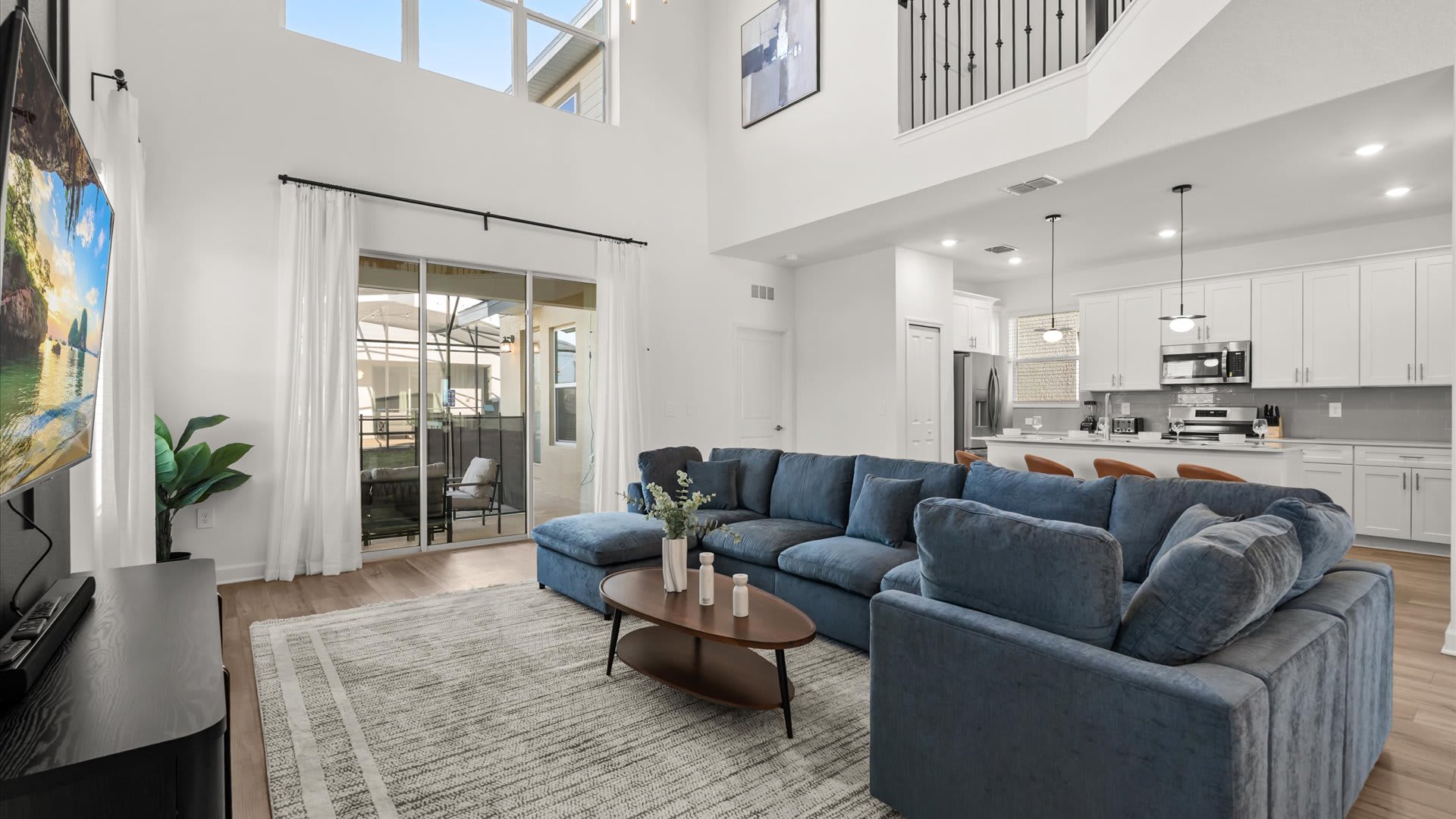 Main living room – Comfortable seating with soaring ceilings