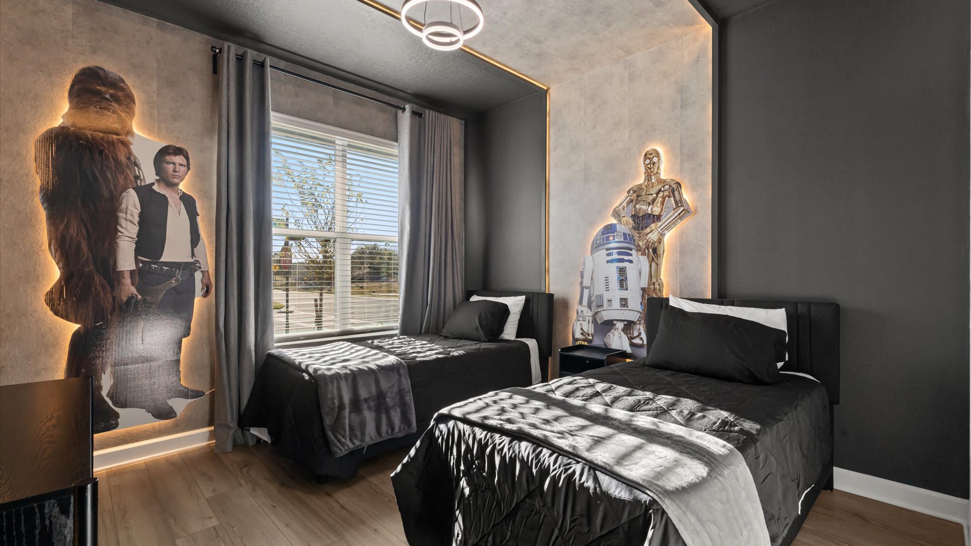 Fun themed twin room – A cool, cinematic space featuring twin beds and immersive décor for a memorable stay.