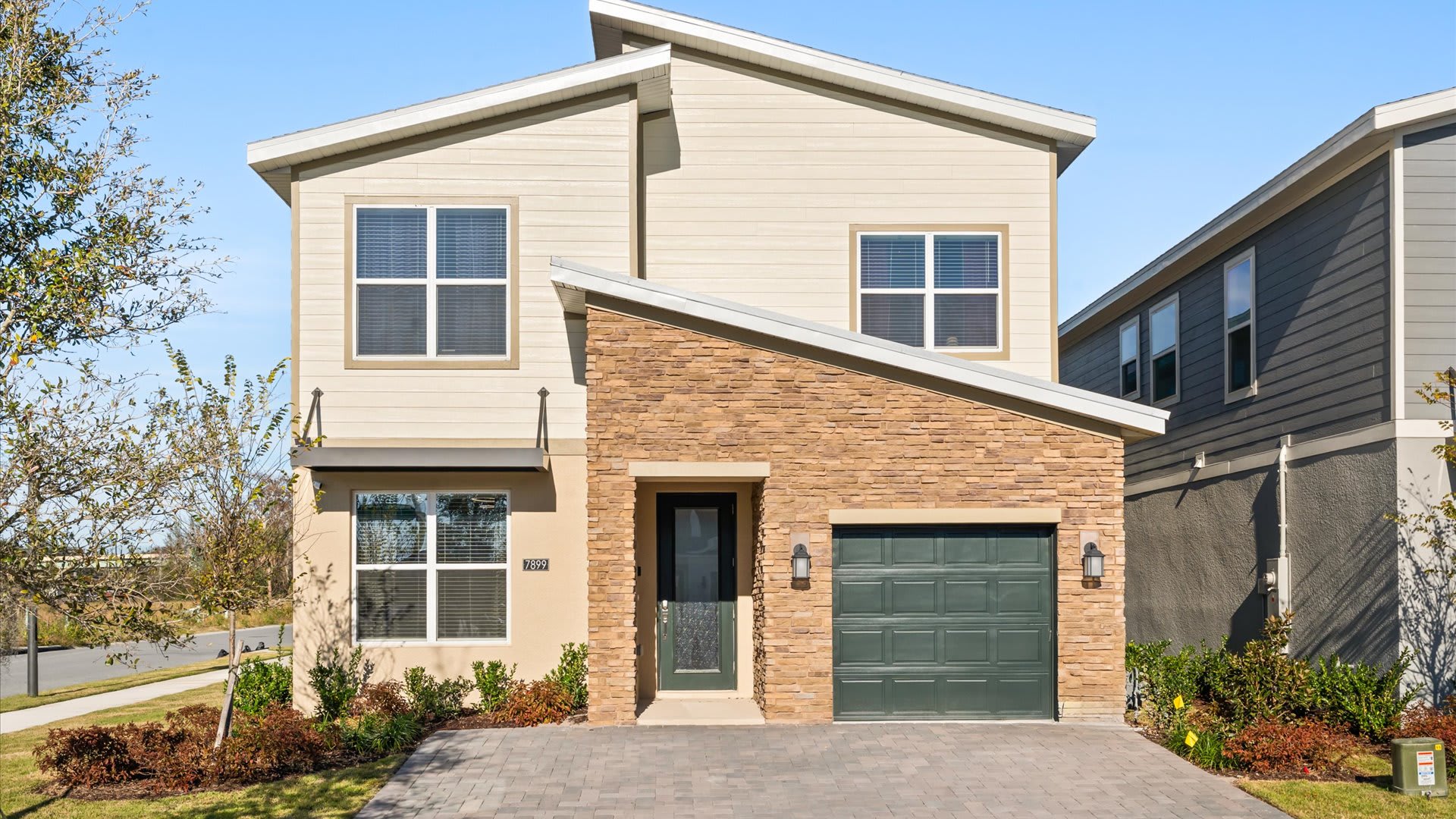 Beautiful exterior & private entrance – A modern home with curb appeal, private driveway, and easy access