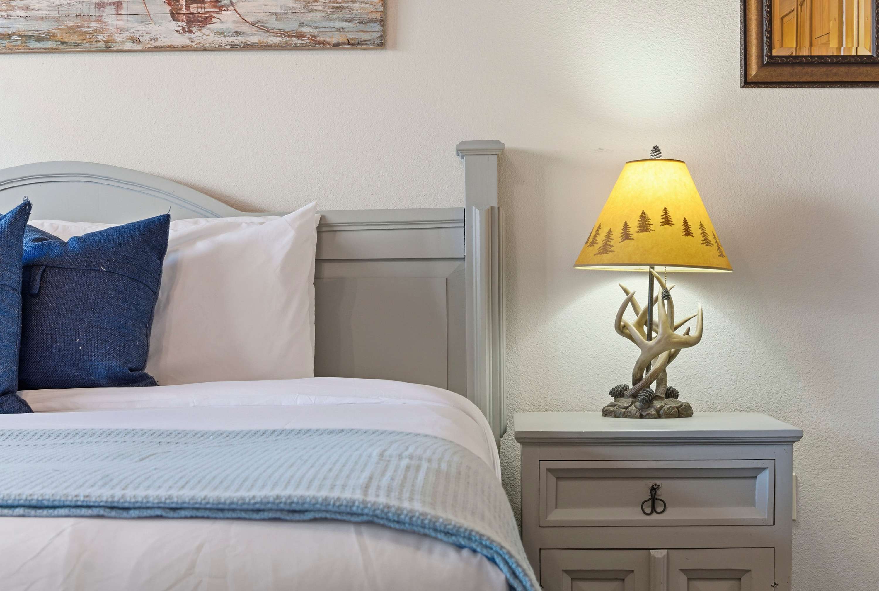 The first bedroom retreat includes a king bed, smart TV, & ensuite bath​