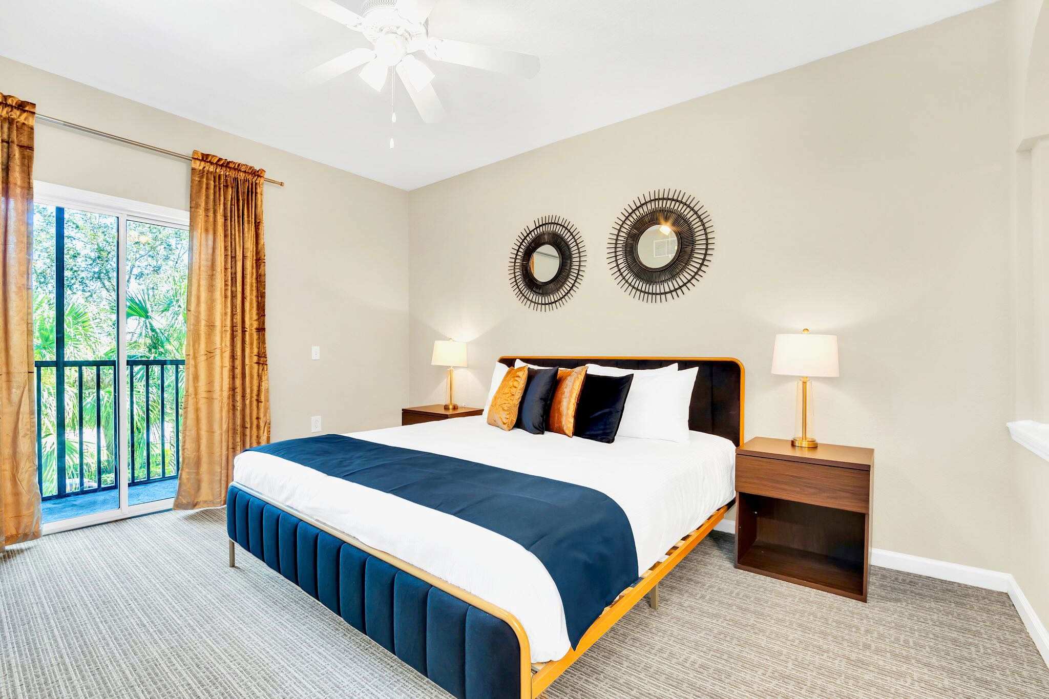 King bedroom with balcony access