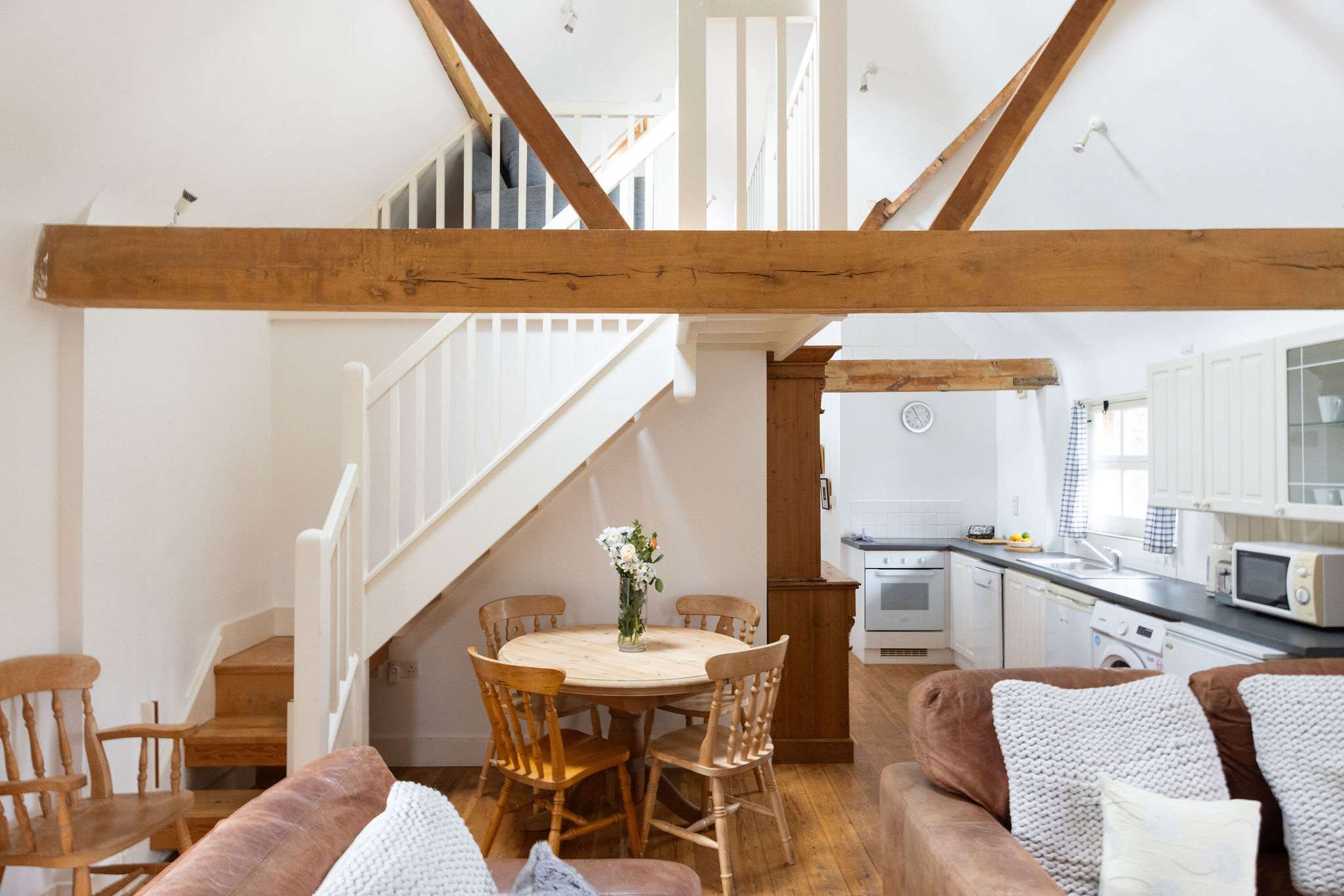 Exposed beams gives the cottage character and charm.