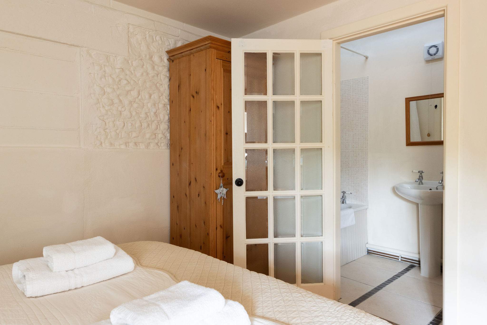 The master king has a handy ensuite with shower, tubby tub (short bath), WC and sink.