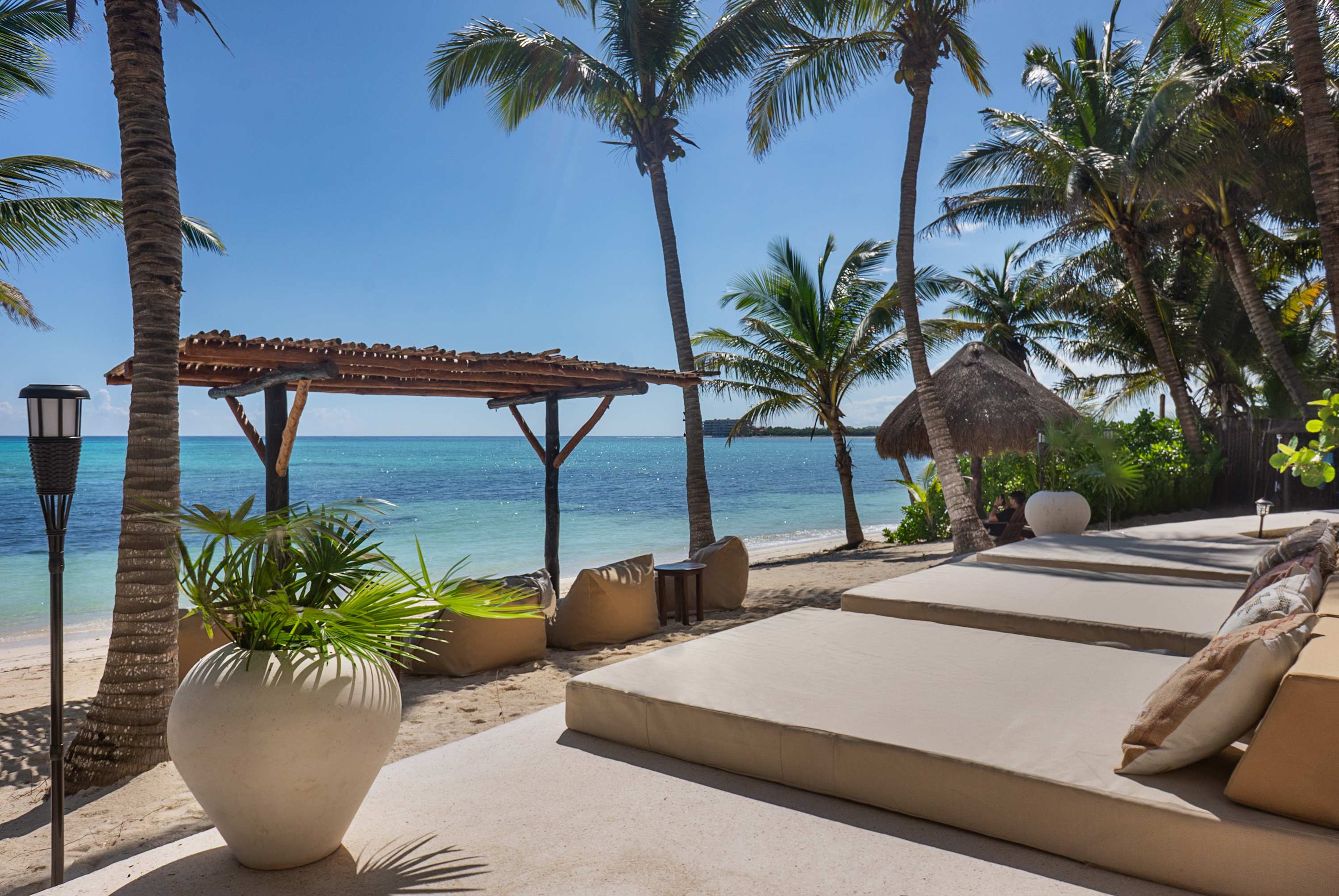 Relax on our sunbeds and soak in the warm sunshine, embraced by ocean breezes and tranquil surroundings.