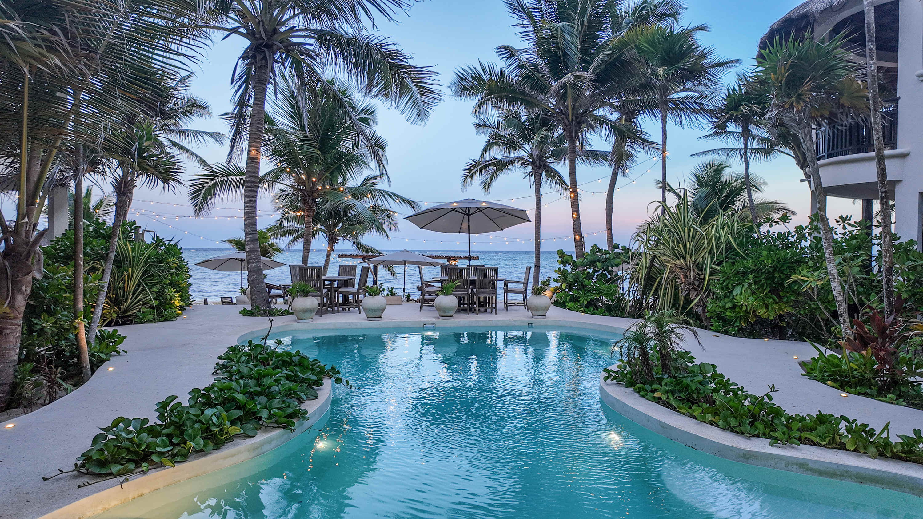 A serene pool overlooking the turquoise ocean