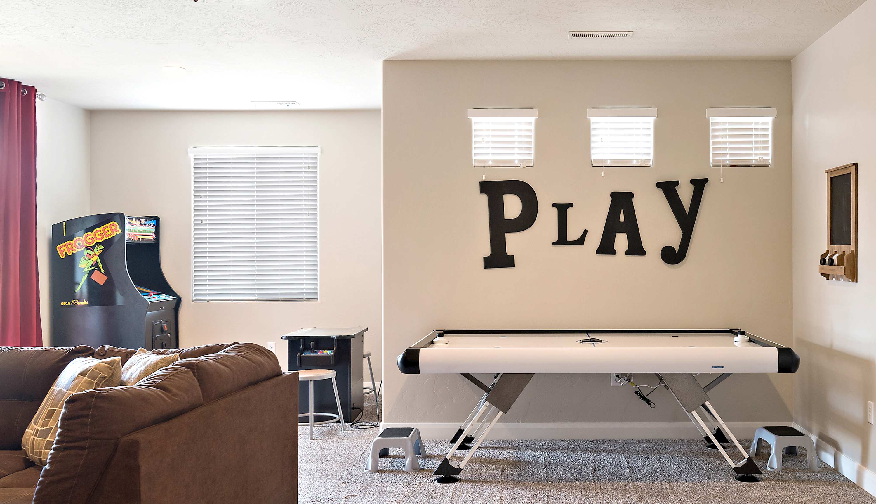 Loaded with games! Air hockey, arcade and a PS4 console
