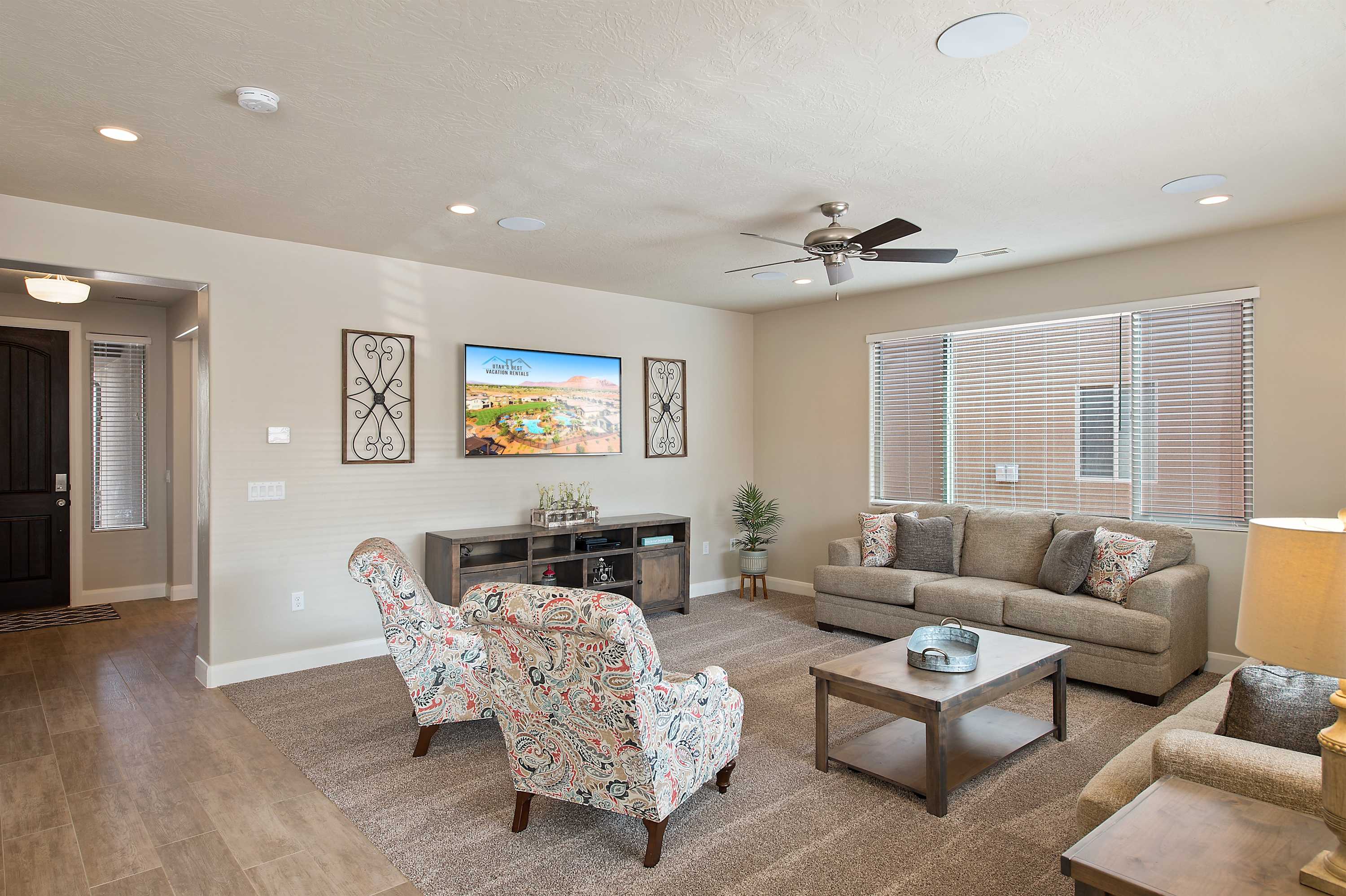 Large open family room space with large 65 inch TV
