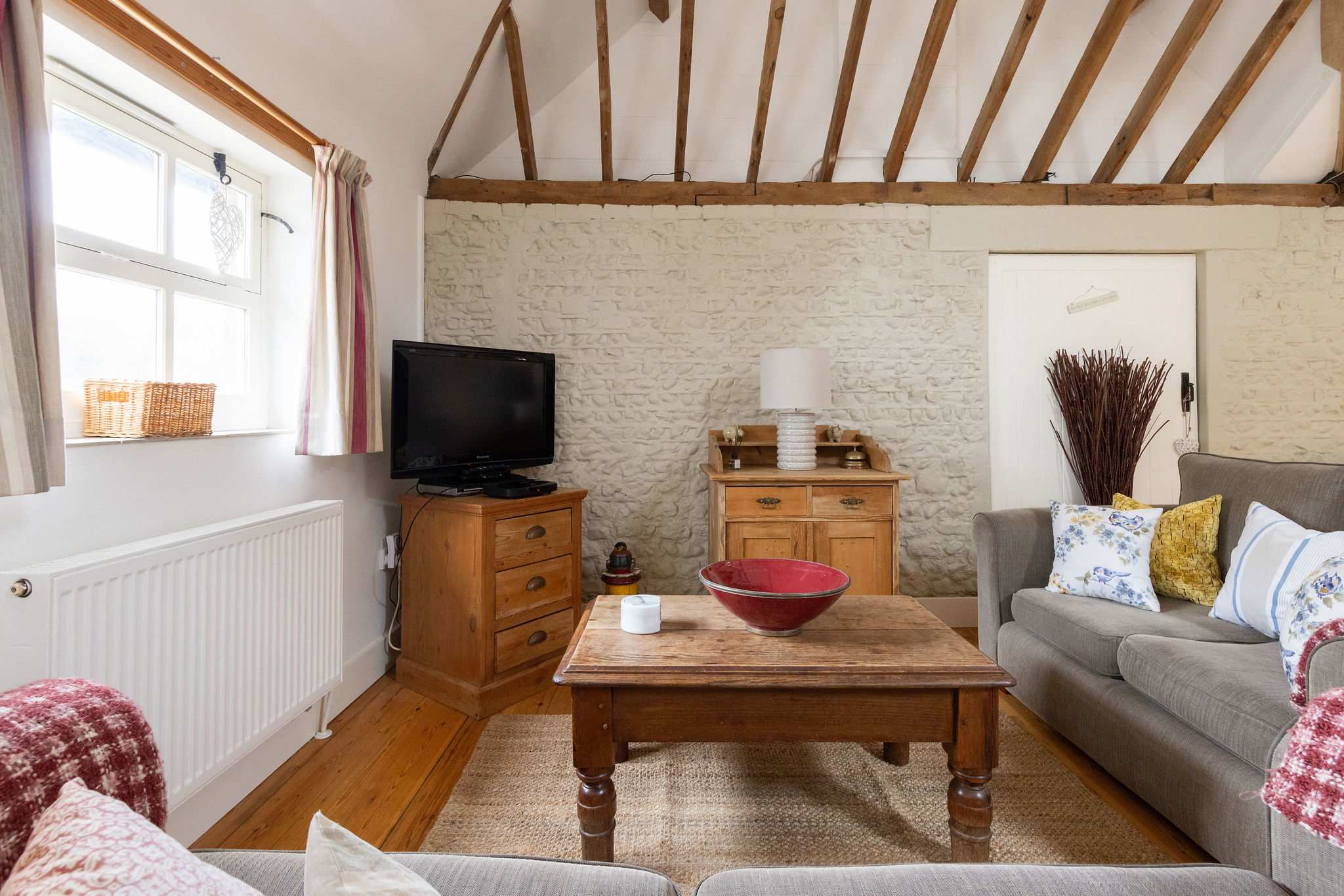 Warm country cottage charm in Wren Barn.