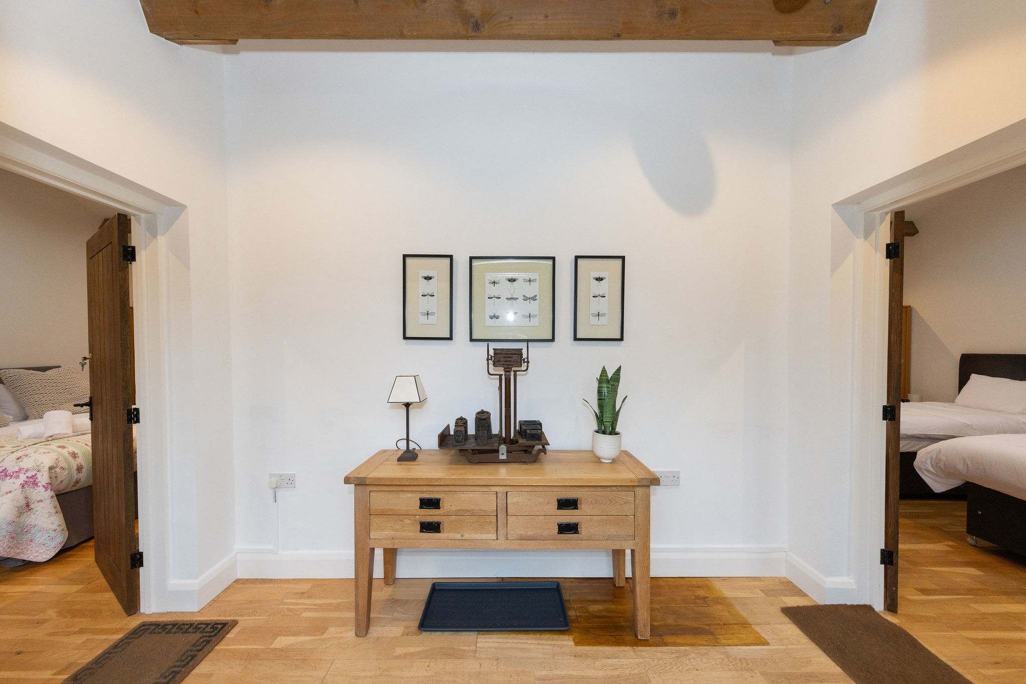 Two self contained ensuite bedrooms share an entrance hallway but have own private, lockable doors to each.