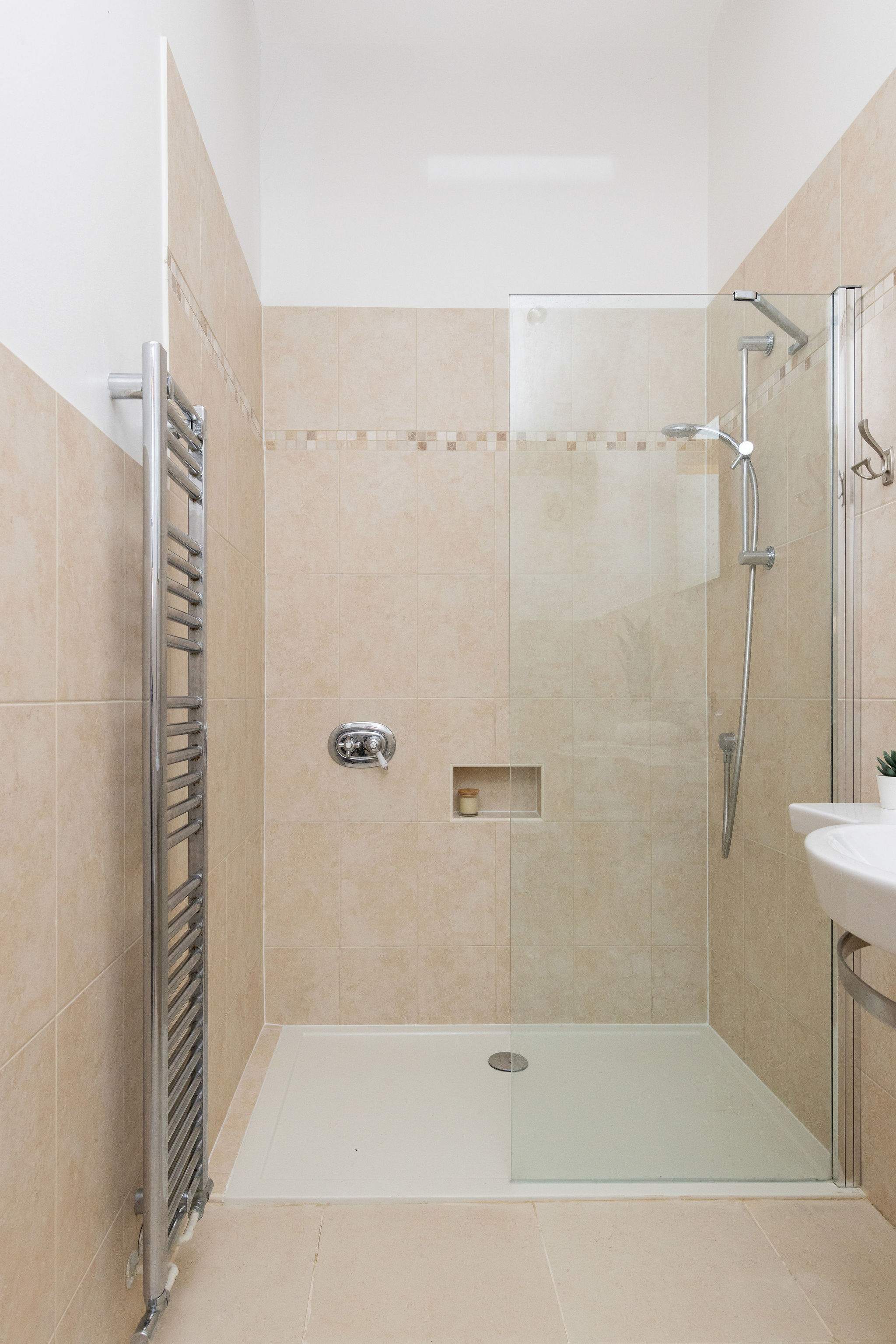 Spacious walk in shower in the ensuite of the Buttercup room.