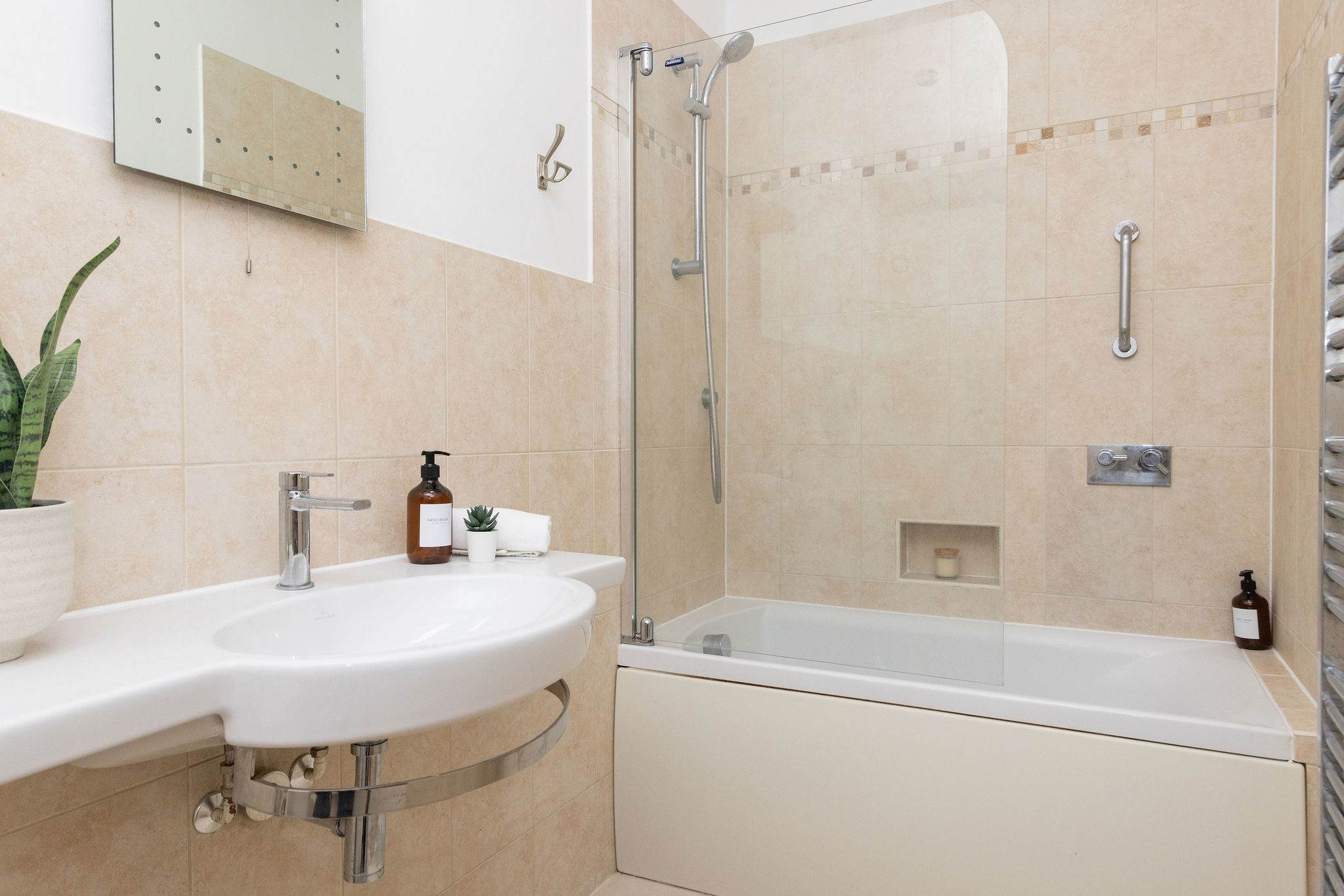 Ensuite with shower over bath.