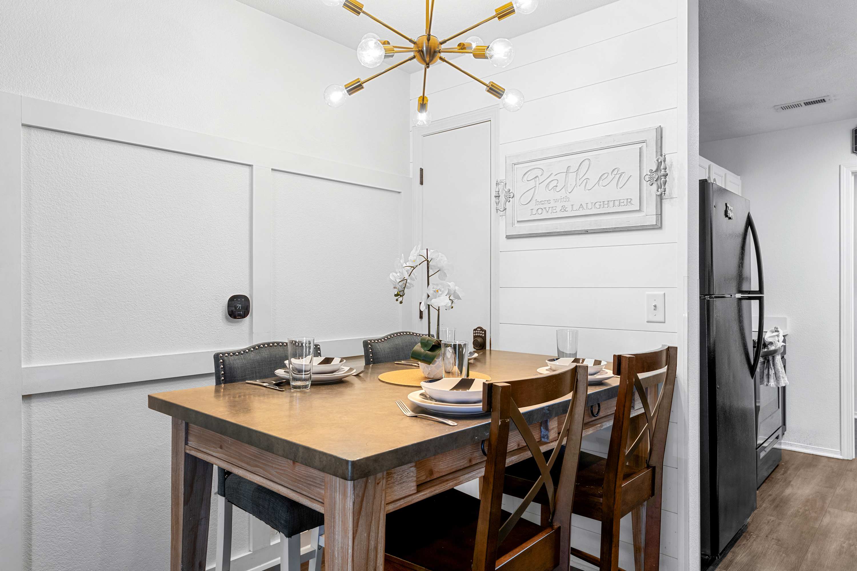 Make mealtime memories together at the dining table, seating 4​