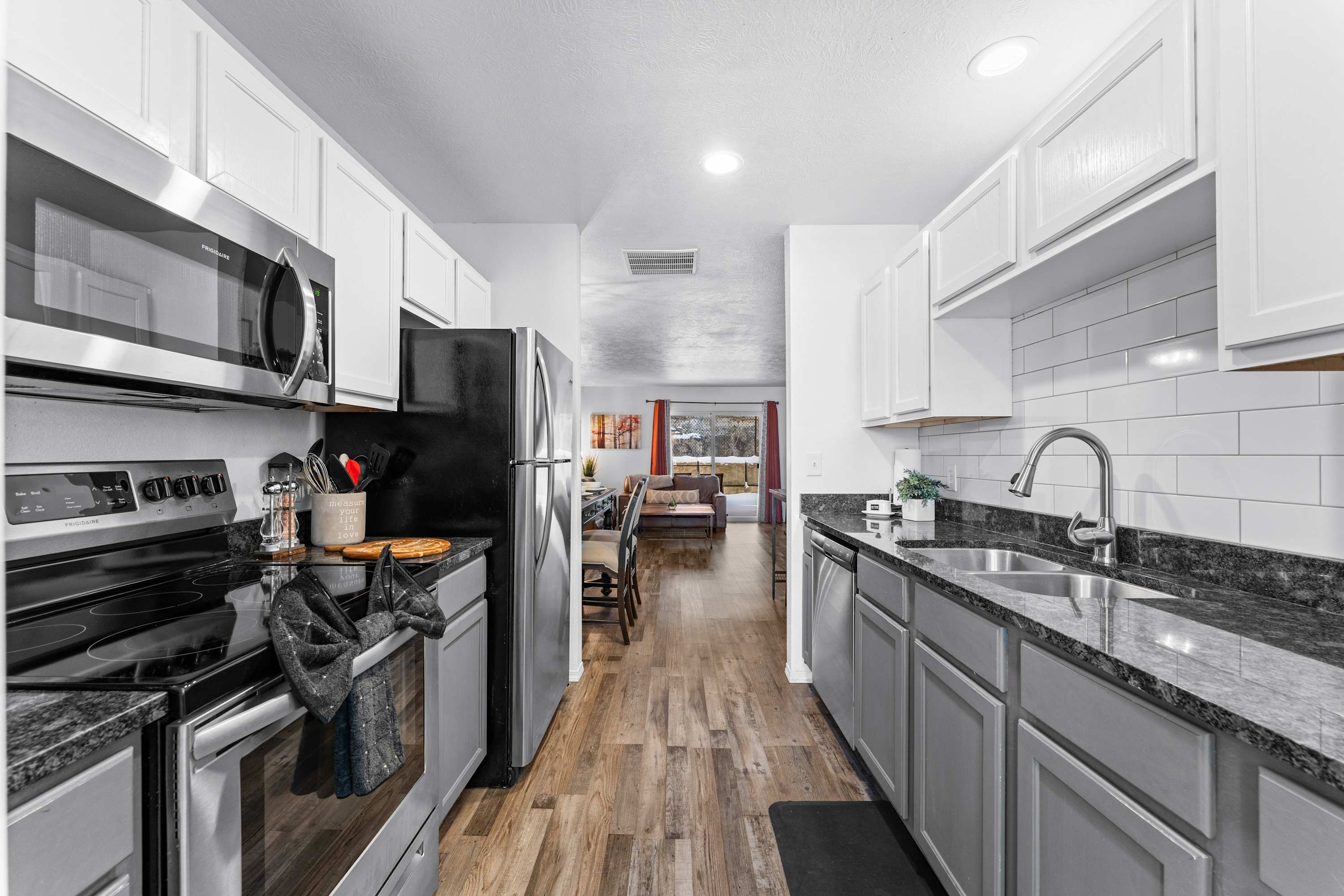 The open kitchen offers ample space & all the comforts of home​