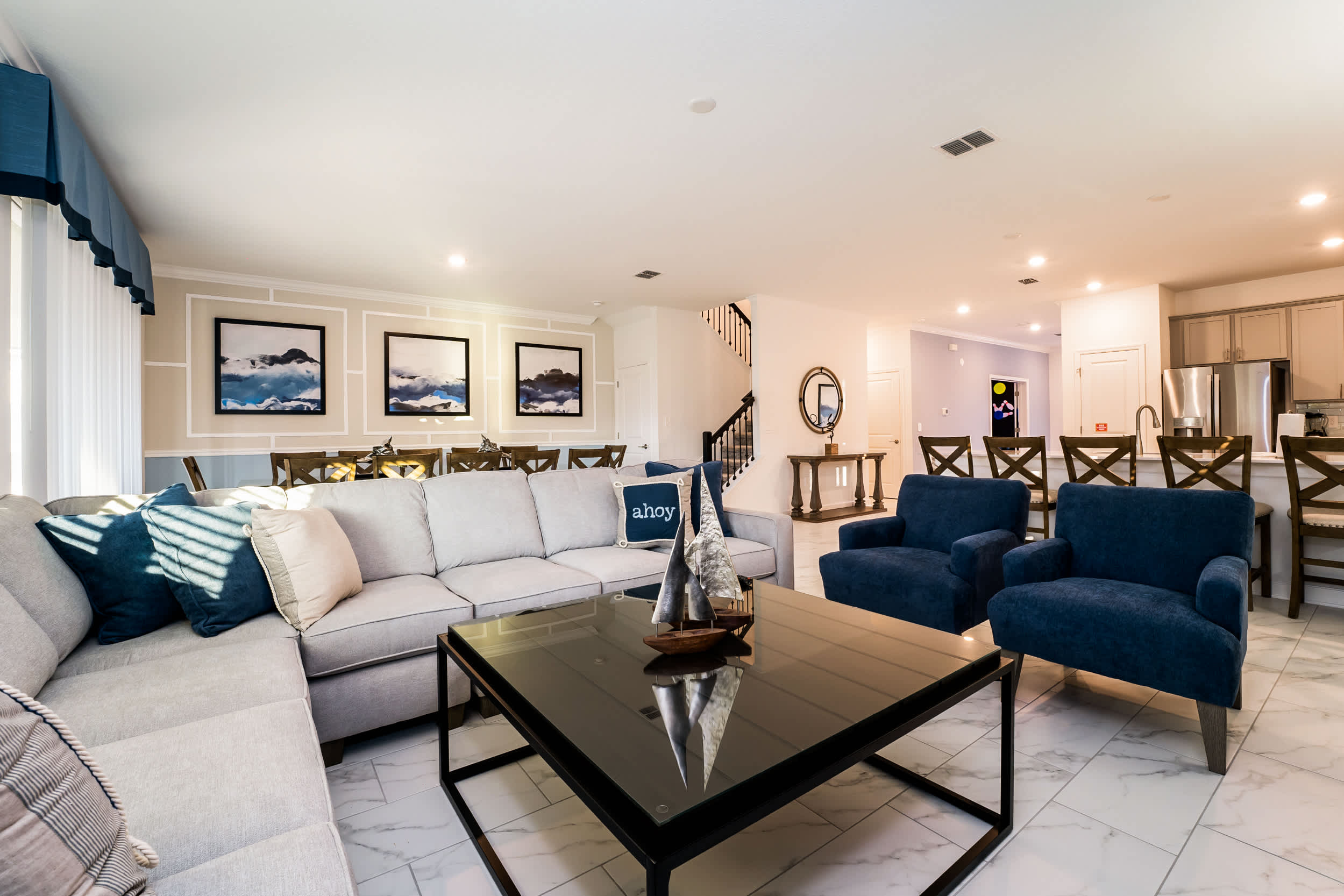 Relax in this elegant living space with plush seating and modern decor, perfect for gatherings and relaxation.