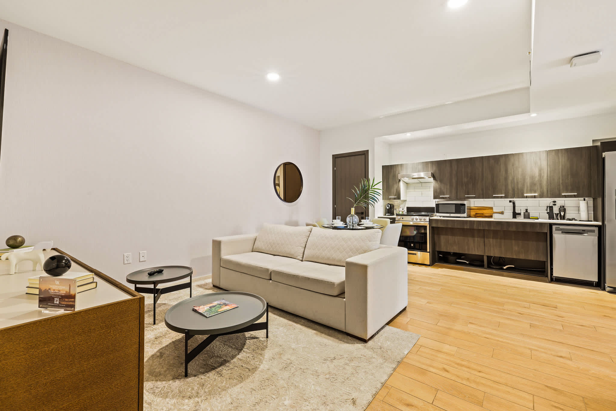 Stylish studio with modern kitchen and cozy living area, perfect for a relaxing stay in the heart of the city.