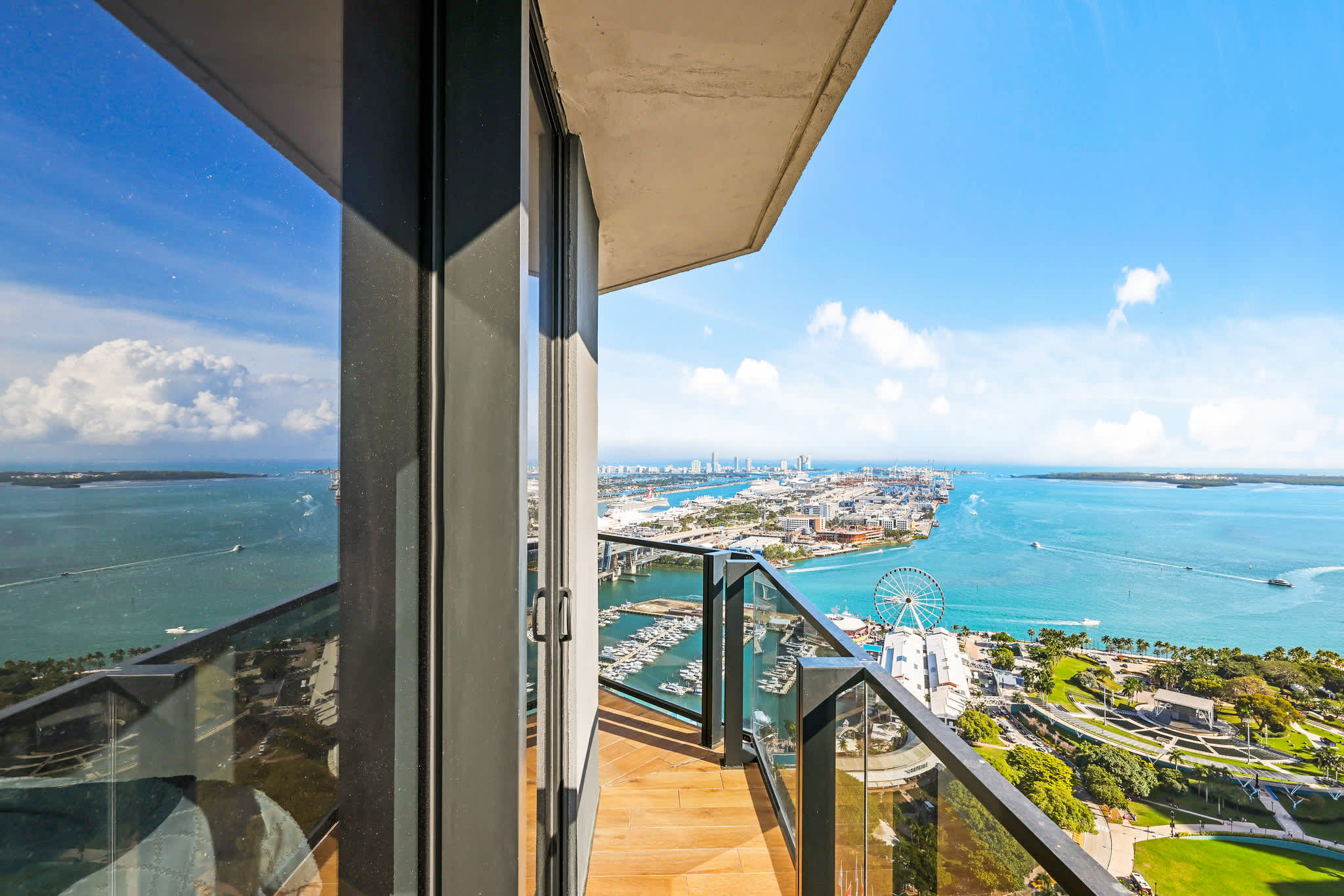 Enjoy breathtaking ocean and city views from your private balcony, perfect for relaxing and taking in the sights.