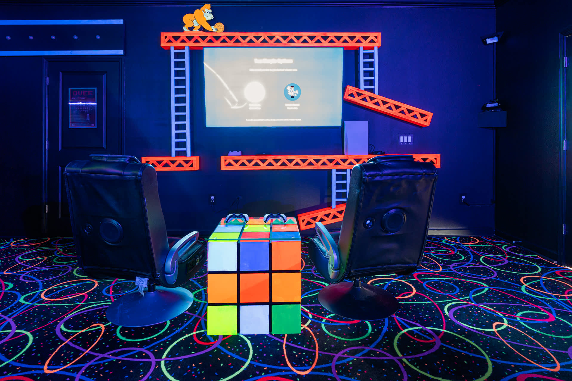 Experience the ultimate retro gaming adventure in this neon-lit game room, perfect for fun-filled nights.