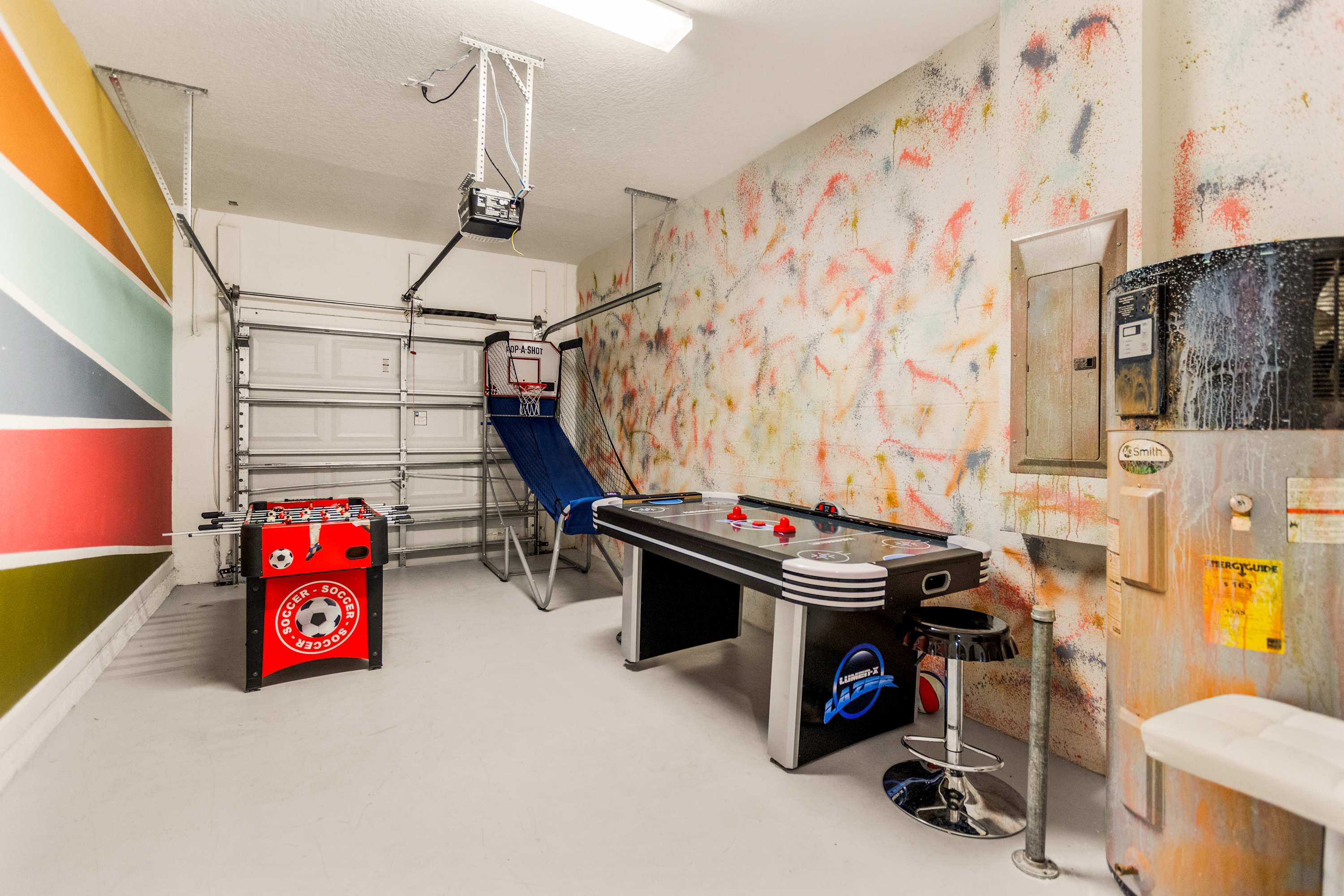 Enjoy endless fun in the vibrant game room with foosball, basketball, and air hockey tables.