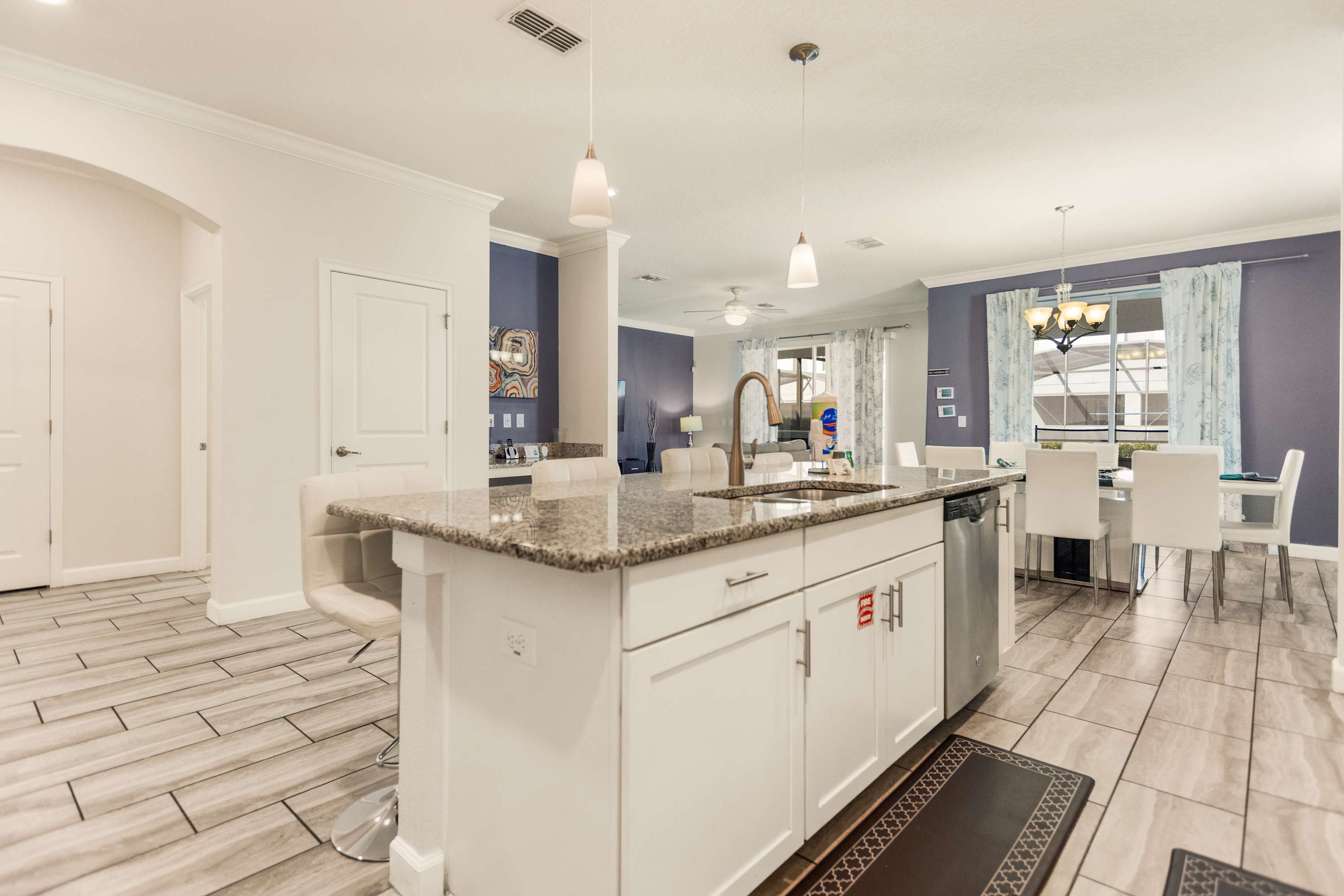 Spacious modern kitchen and dining area perfect for family gatherings and entertaining.