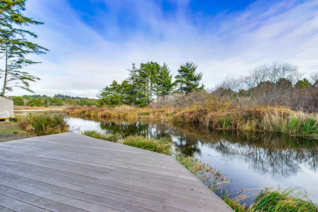 Riverfront Home, 3 Blocks to Beach | Canal Cottage