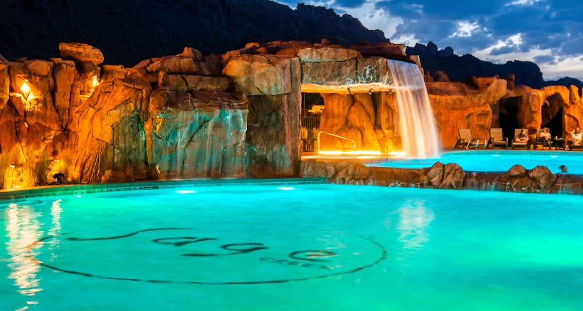 Waterfalls at the gorgeous community pool, featuring a grotto hot tub