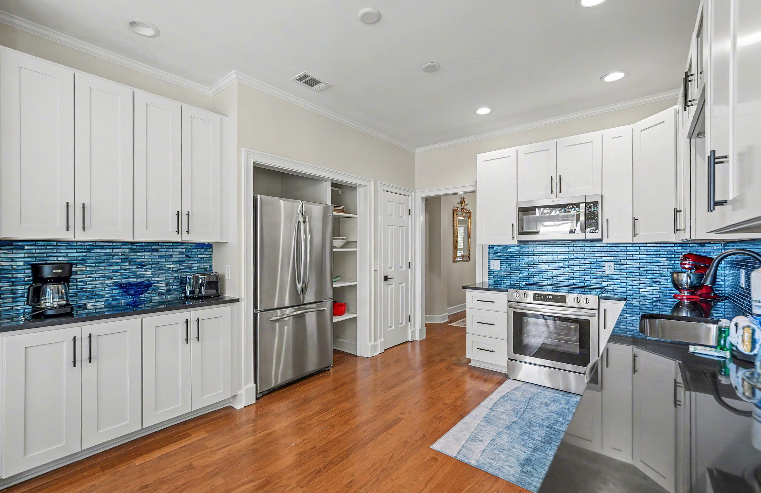 Kitchen with Additional Table with Access out to Back Deck 