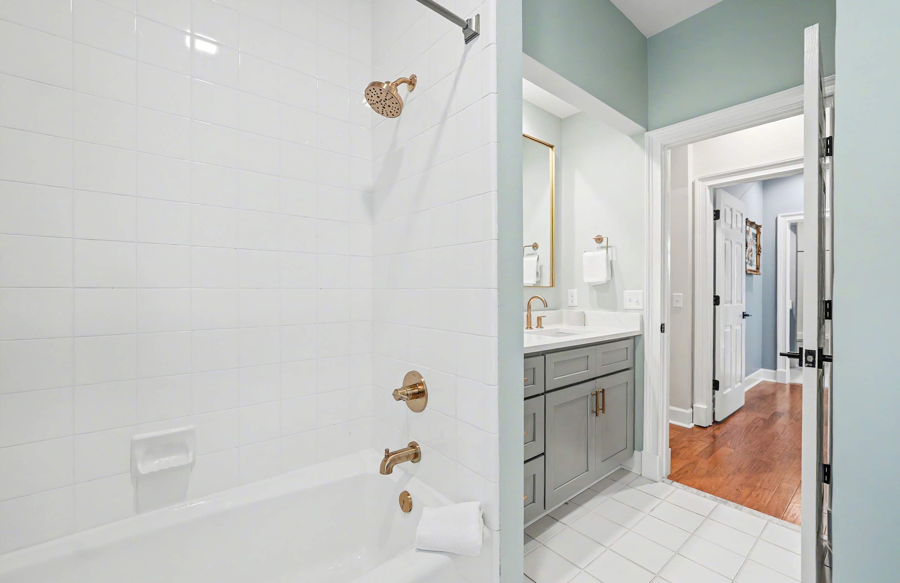 Guest Bathroom With Hallway Access. Featuring a Tub/Shower Combo