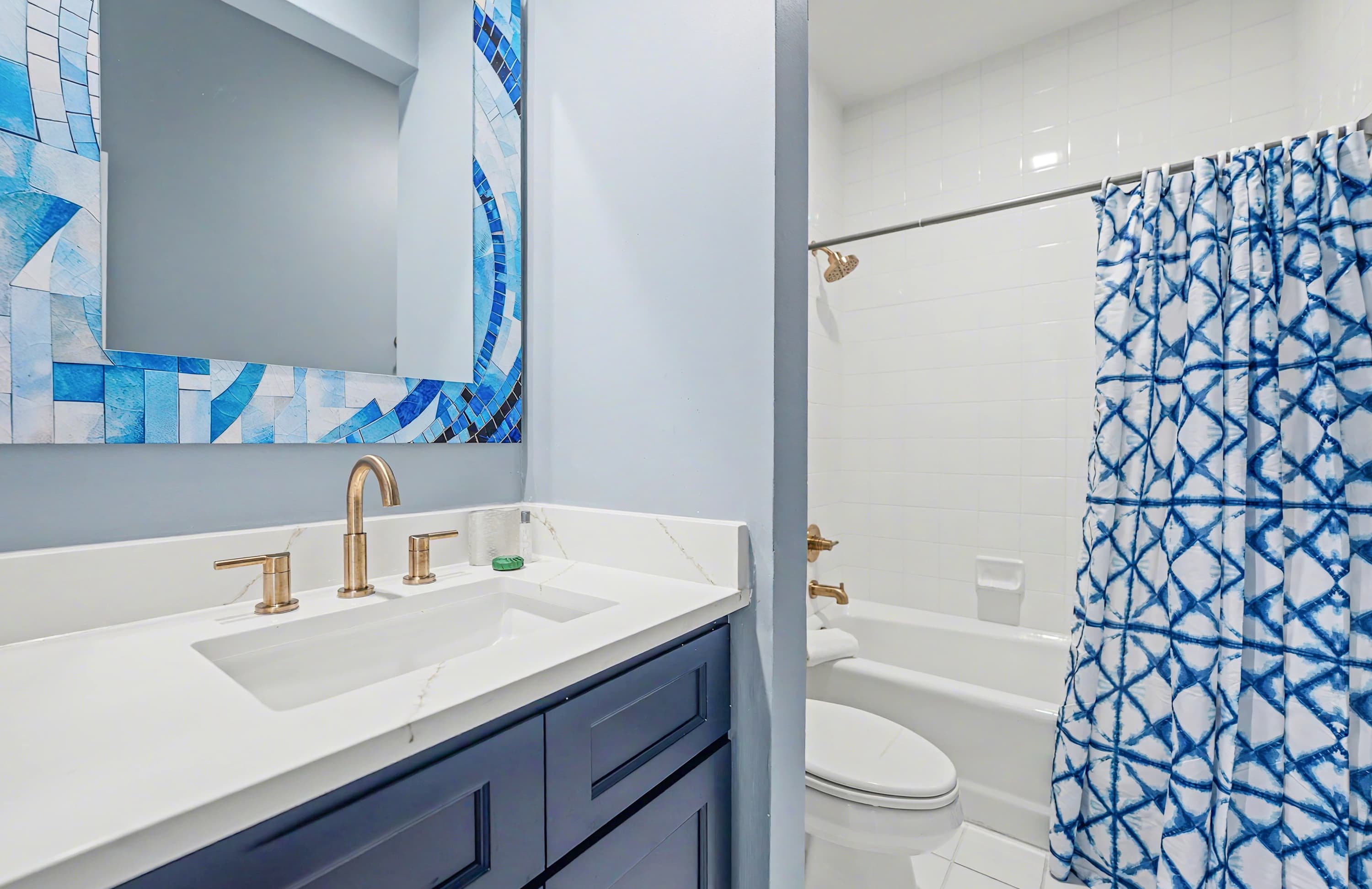 Guest Bathroom With Hallway Access. Featuring a Tub/Shower Combo